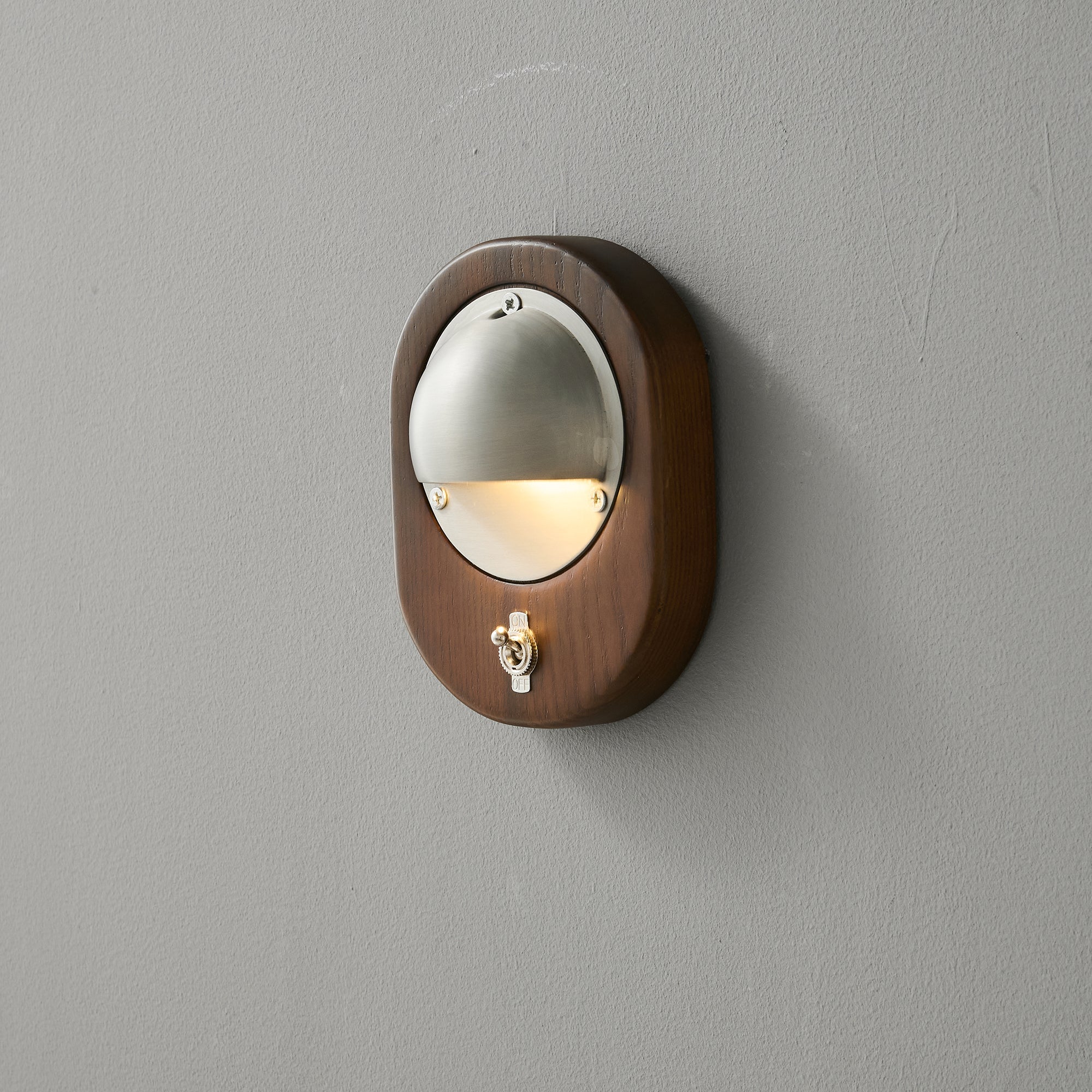 The Alfi Wall Lamp from a low angle, looking up.
