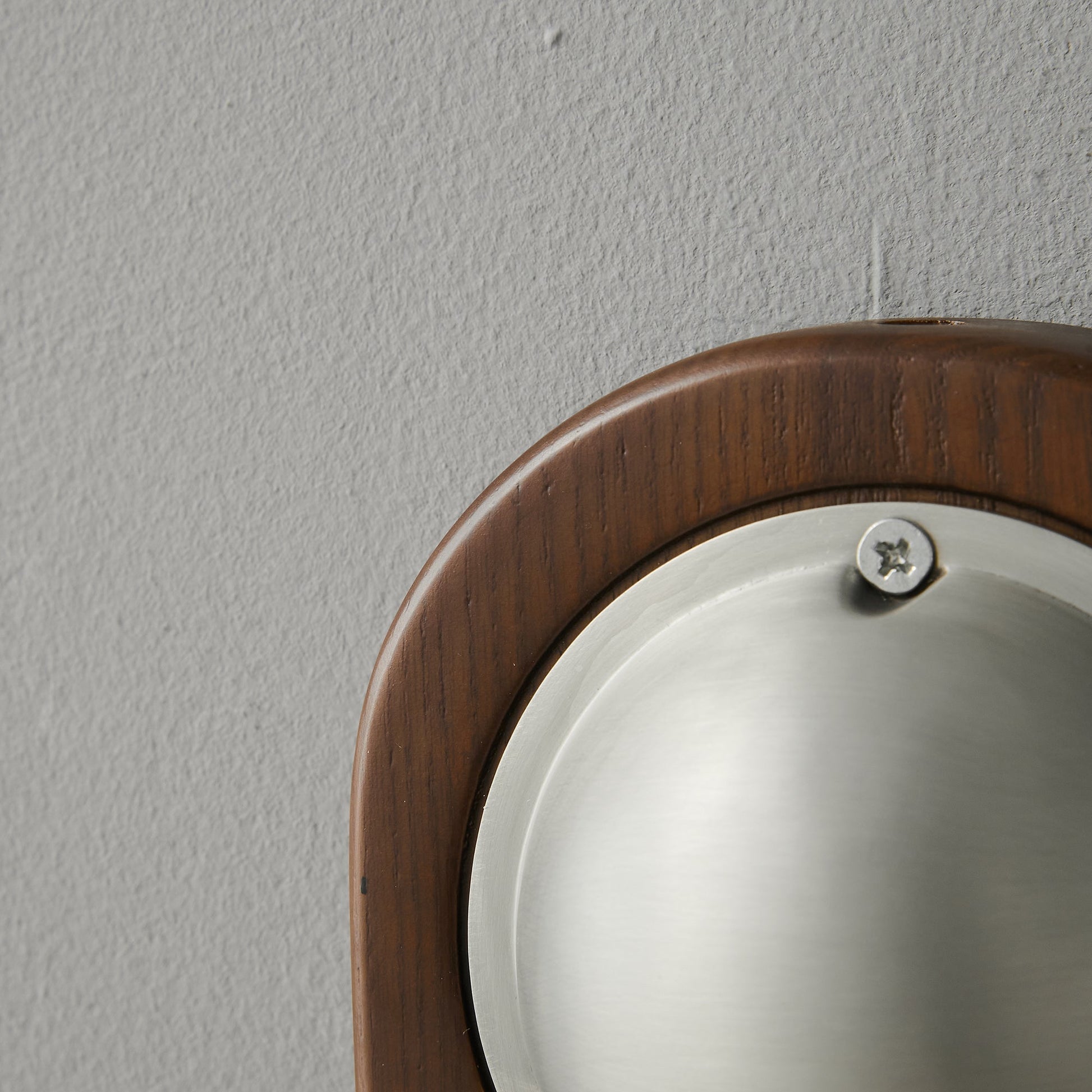 Close-up of the texture of the brass lampshade.