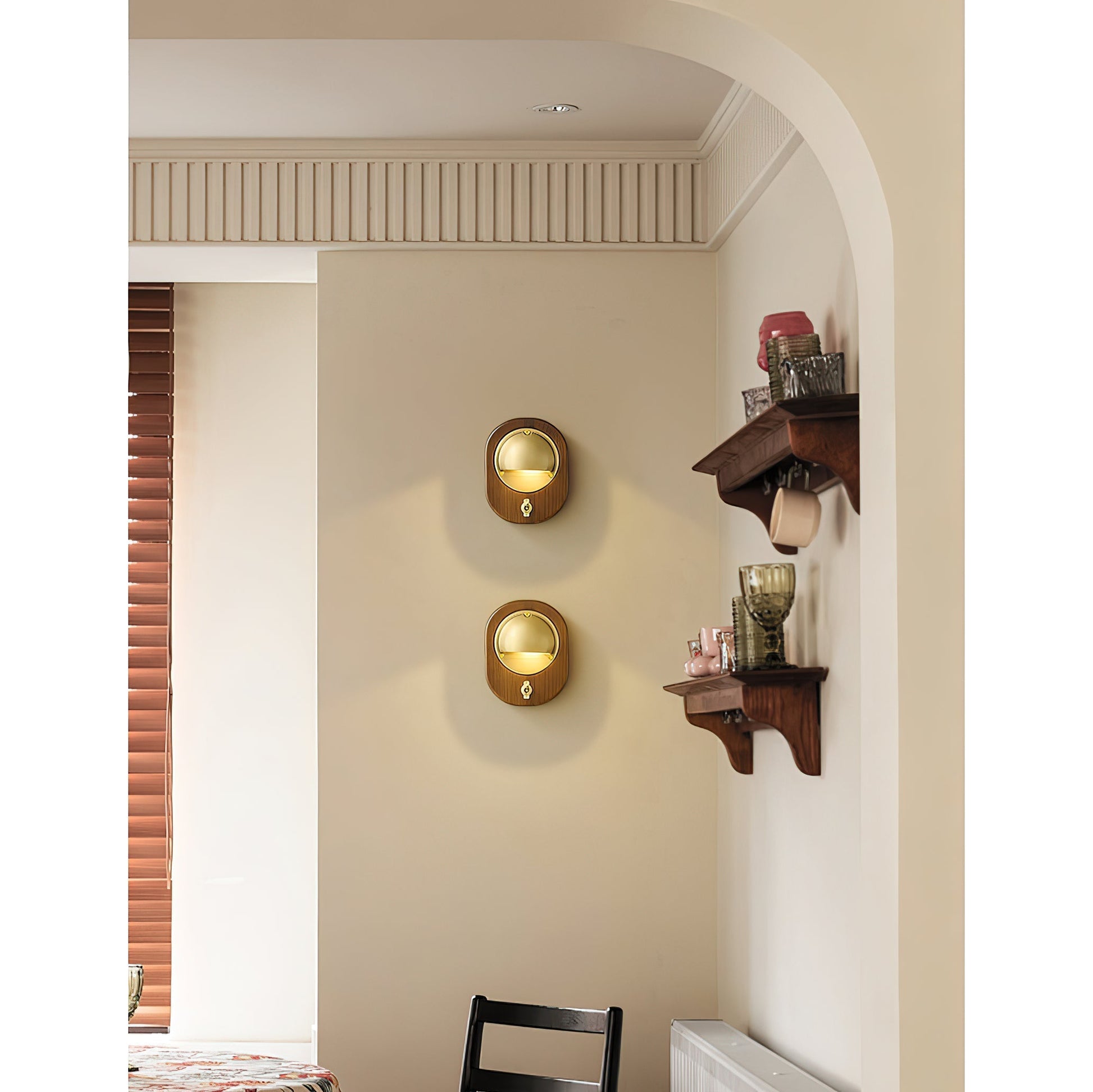 Lifestyle image of the Alfi Wall Lamp in a cozy reading nook.