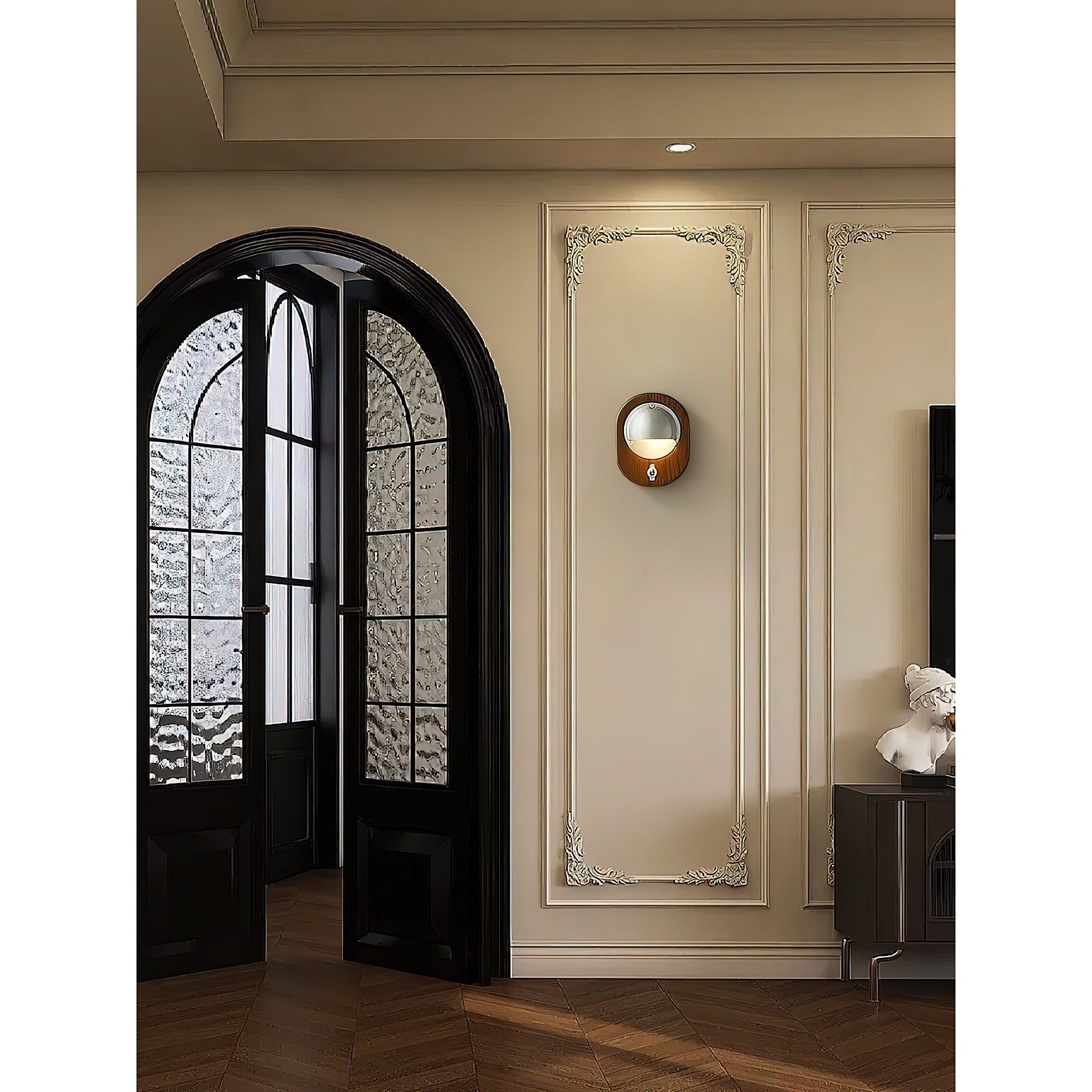 The Alfi Wall Lamp turned on, casting a warm glow.