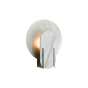 Alice Wall Lamp in black finish with marble shade, shown against a neutral wall.