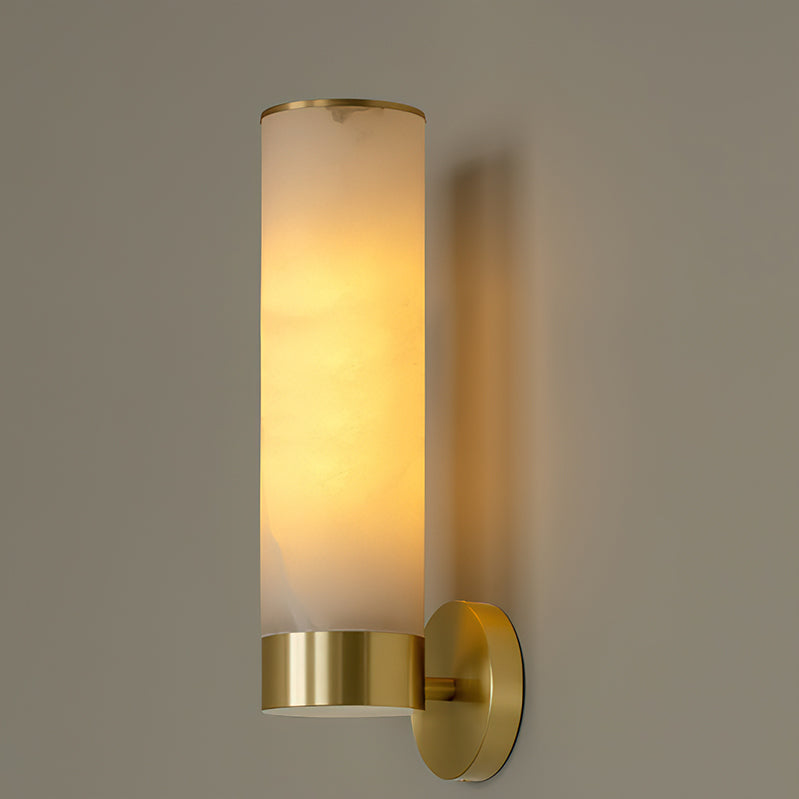 Two Alistair wall sconces flanking a modern bathroom mirror.