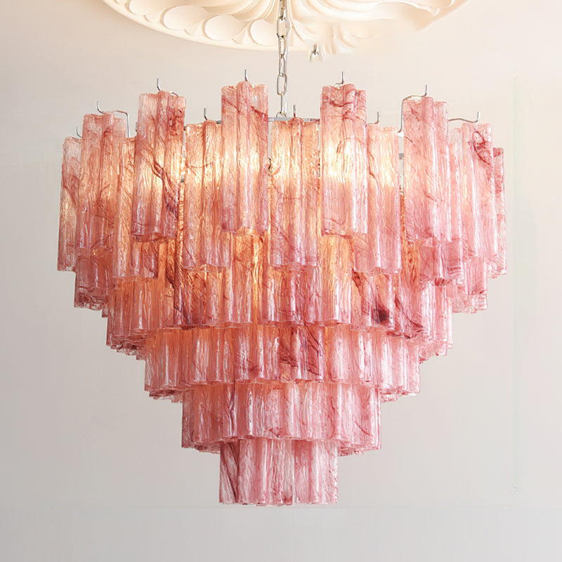 Lifestyle image of the Alistair Chandelier in a high-ceiling foyer.