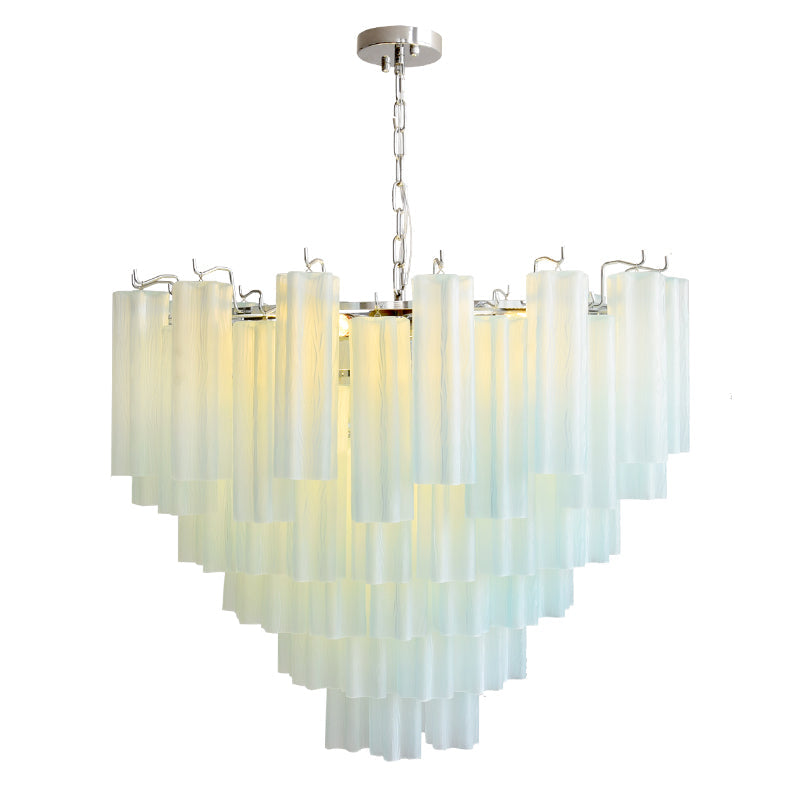 The Alistair Chandelier illuminating a modern dining room.