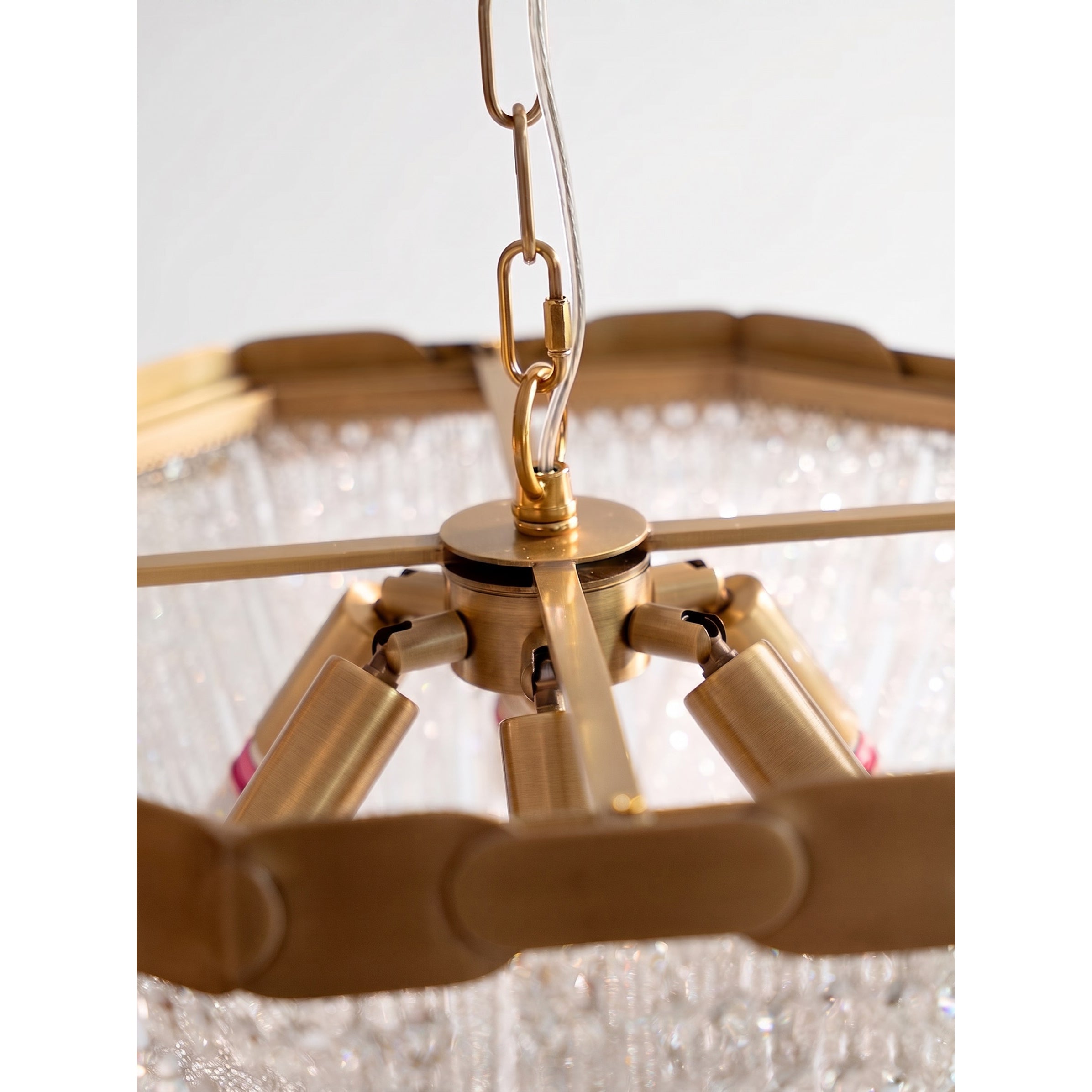 Detail of the light reflecting through the shimmering crystal beads.