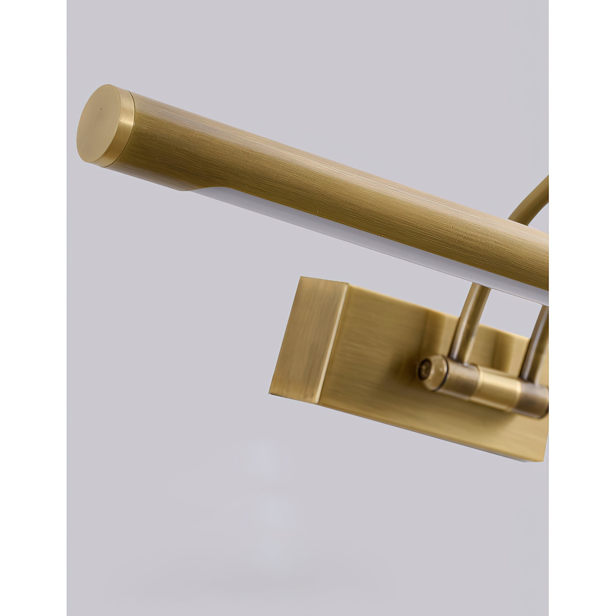 Alton rechargeable wall lamp in antique brass finish, angled view.