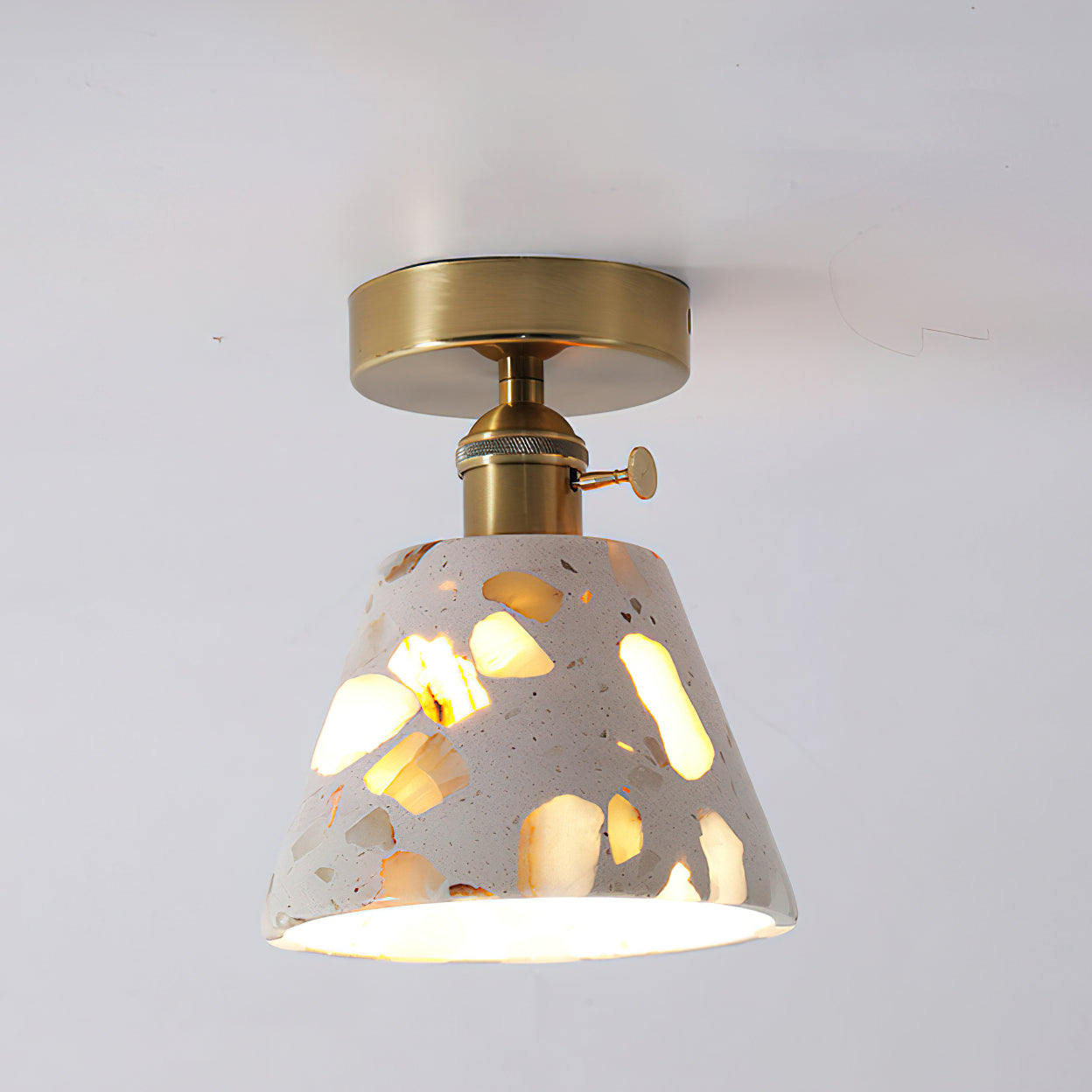 Alvaro Ceiling Lamp, Model B, turned on, highlighting the stone's translucency.