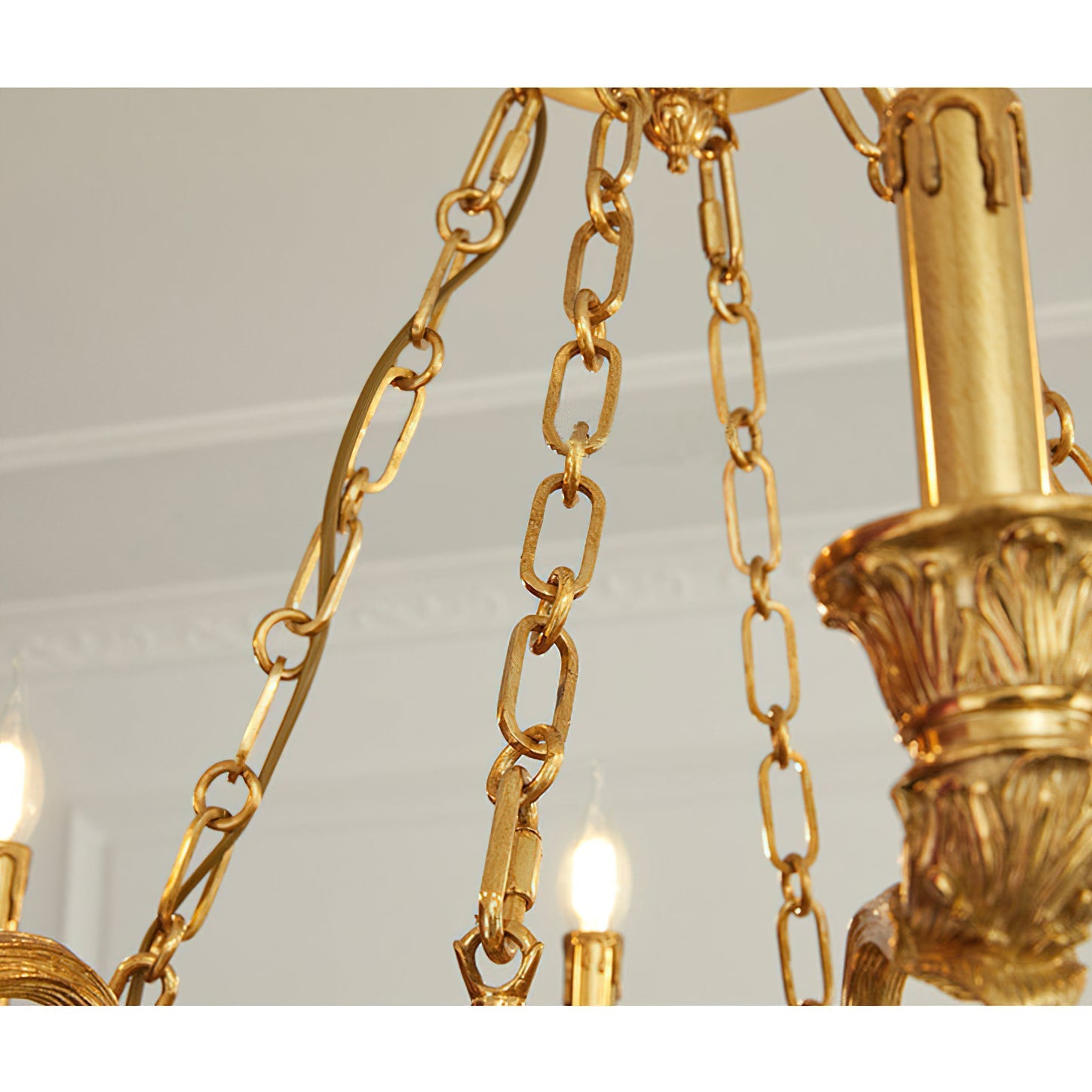 Another angle of the cast brass detailing on the chandelier arms.