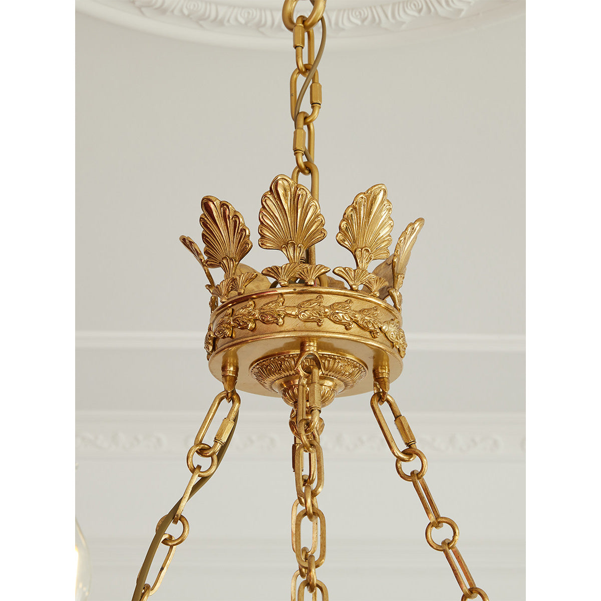 Close-up on the scrollwork of the lower bowl.
