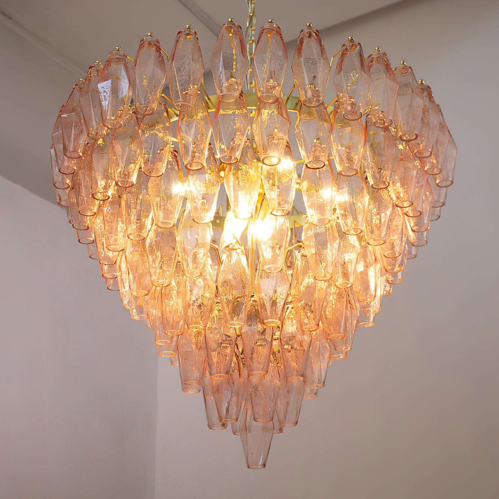 Ametista Chandelier with green glass prisms in a contemporary living room.