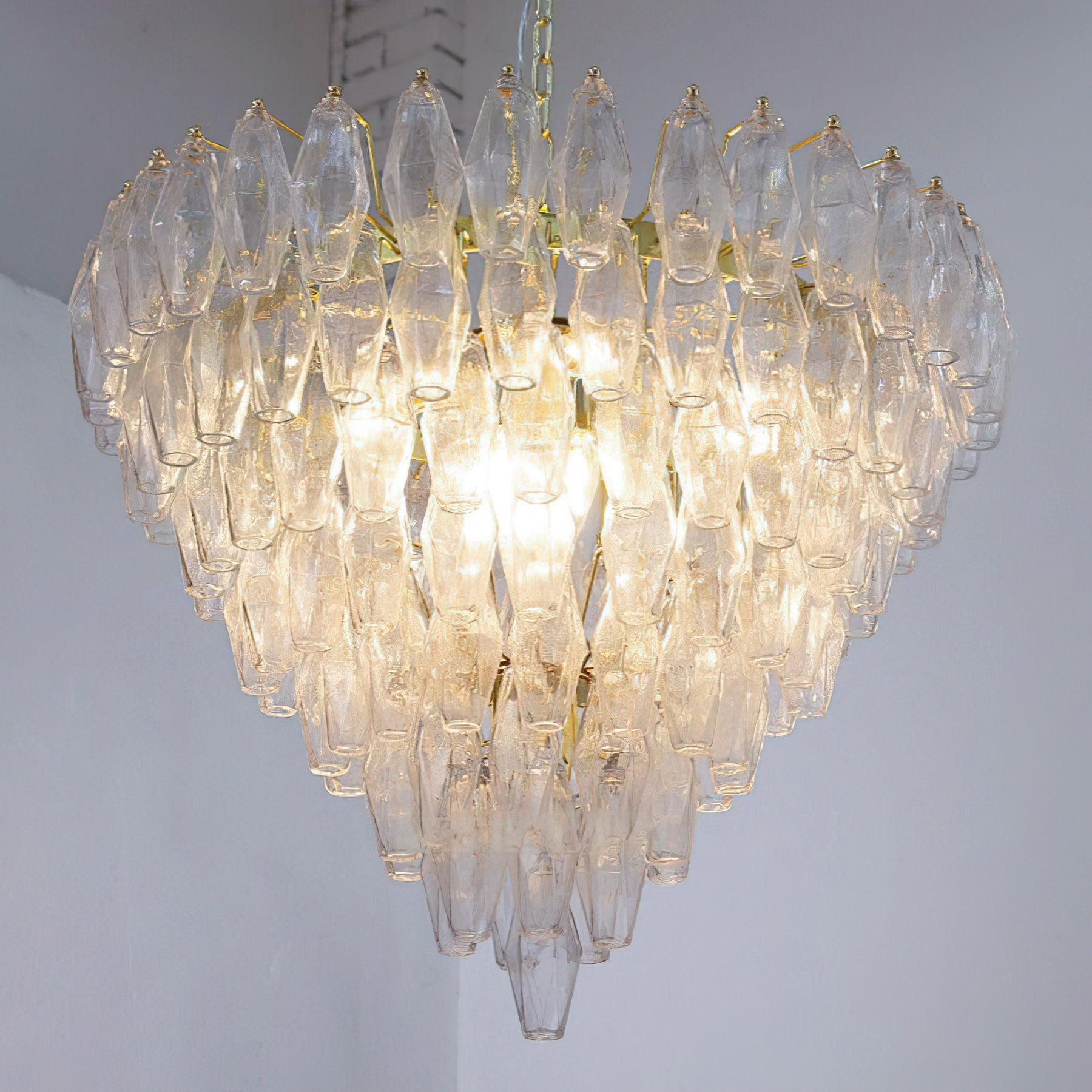 Close-up of the warm, inviting glow from the amber glass prisms.