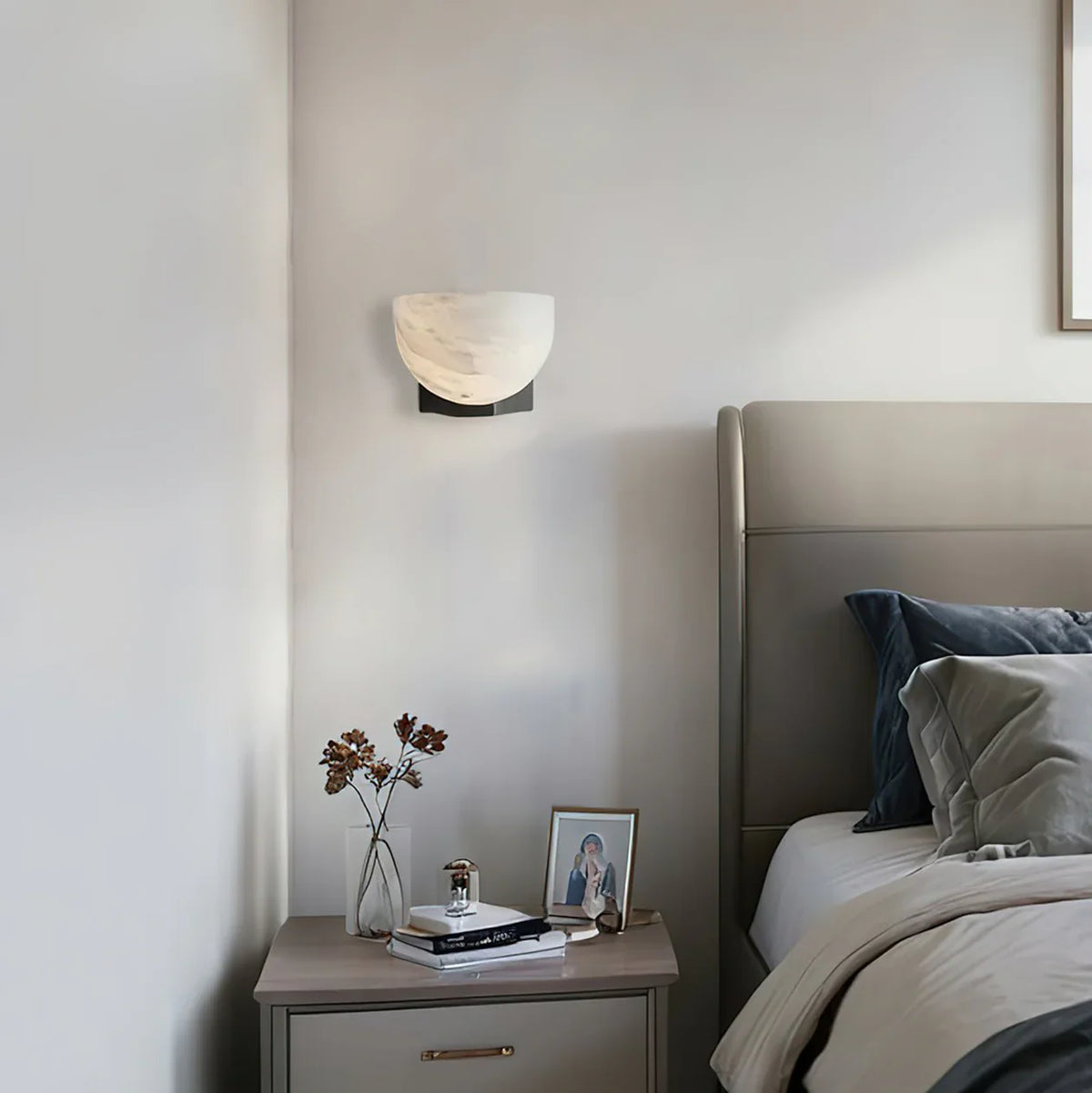 The Ando Sconce in the Antique Brass finish.