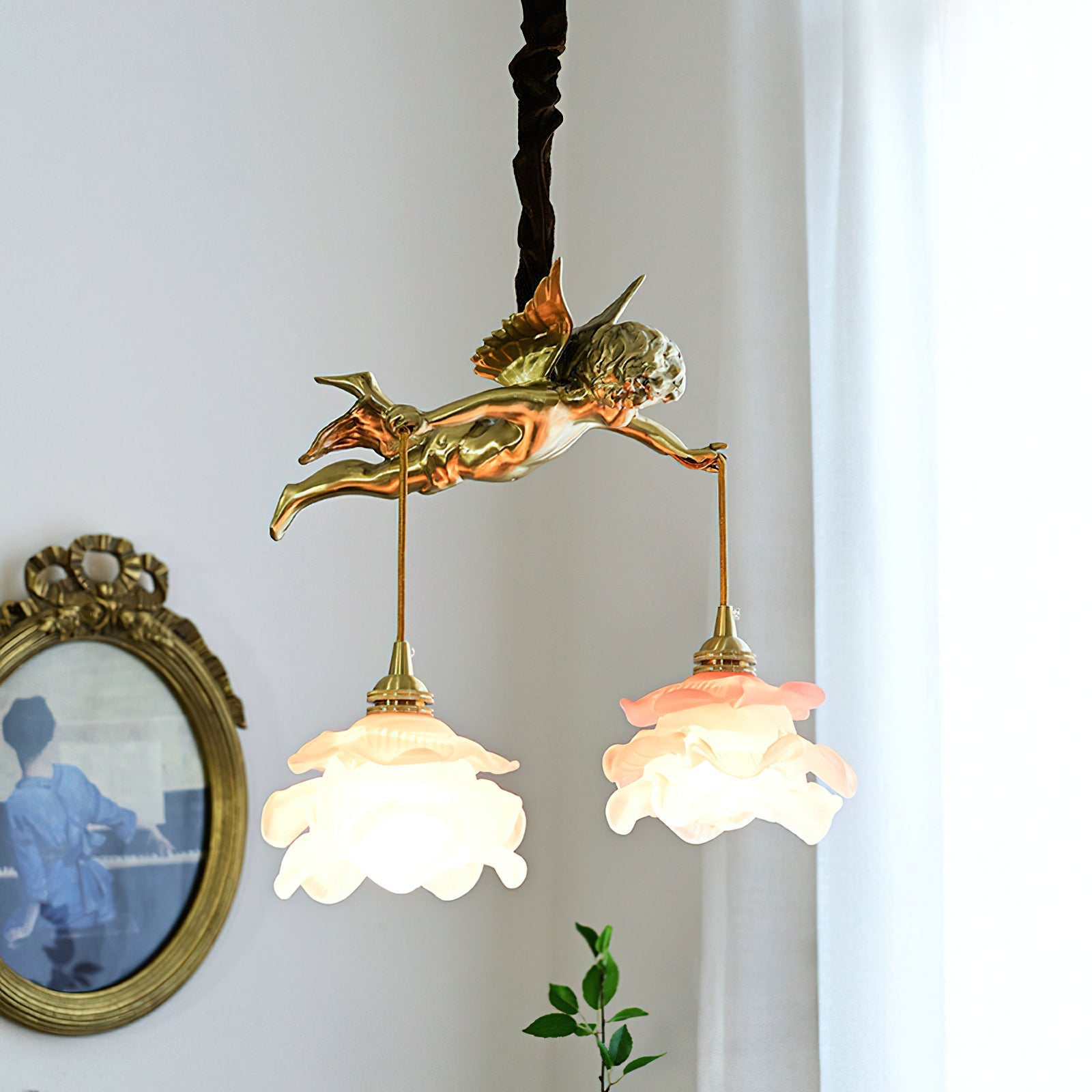 Close-up of the frosted pink glass shade with delicate veining.