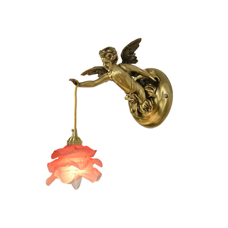The wall lamp casting a soft, romantic glow on a wall.