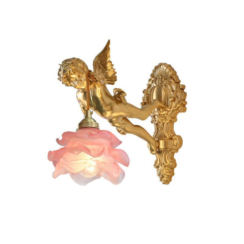 The golden cherub figure from a low angle.