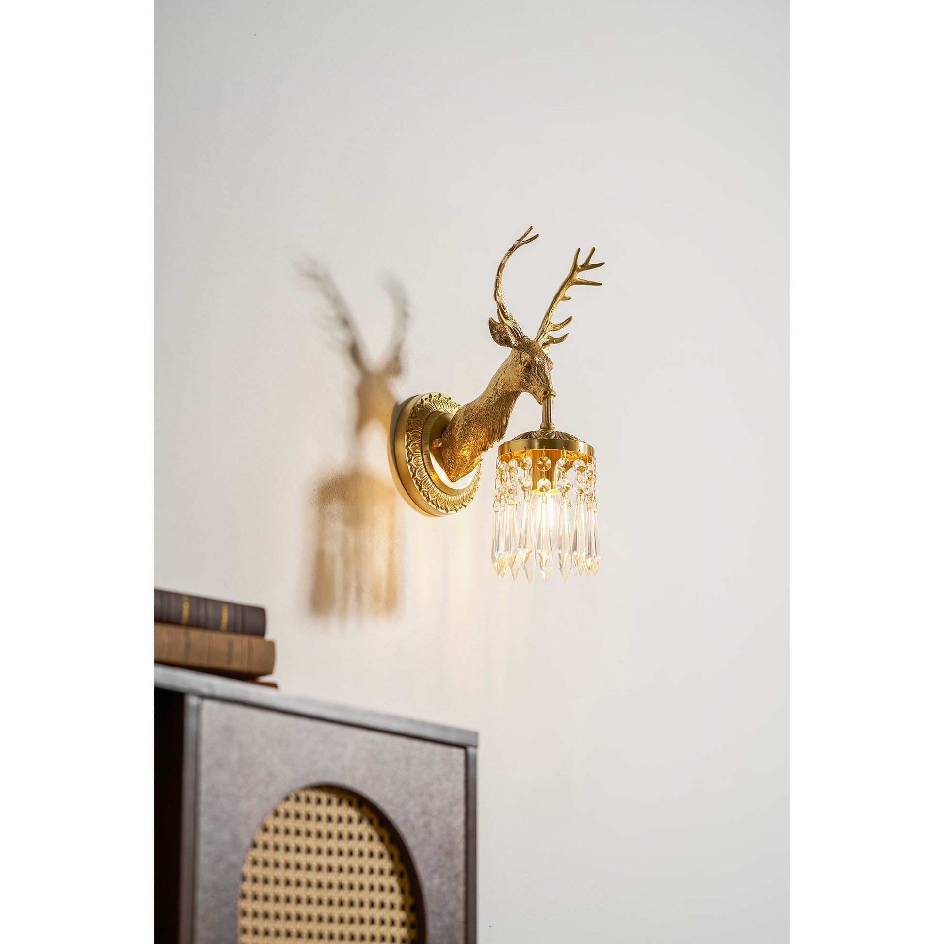 Close-up of the stag's mouth holding the candle cup.