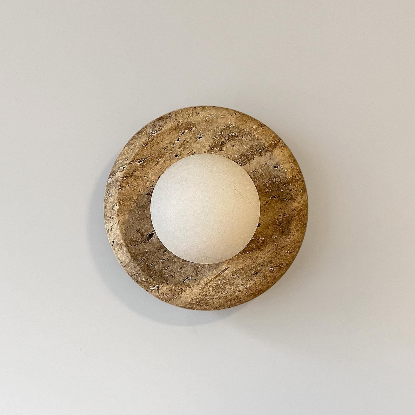 Detail shot of the glass lampshade and G9 socket fixture.