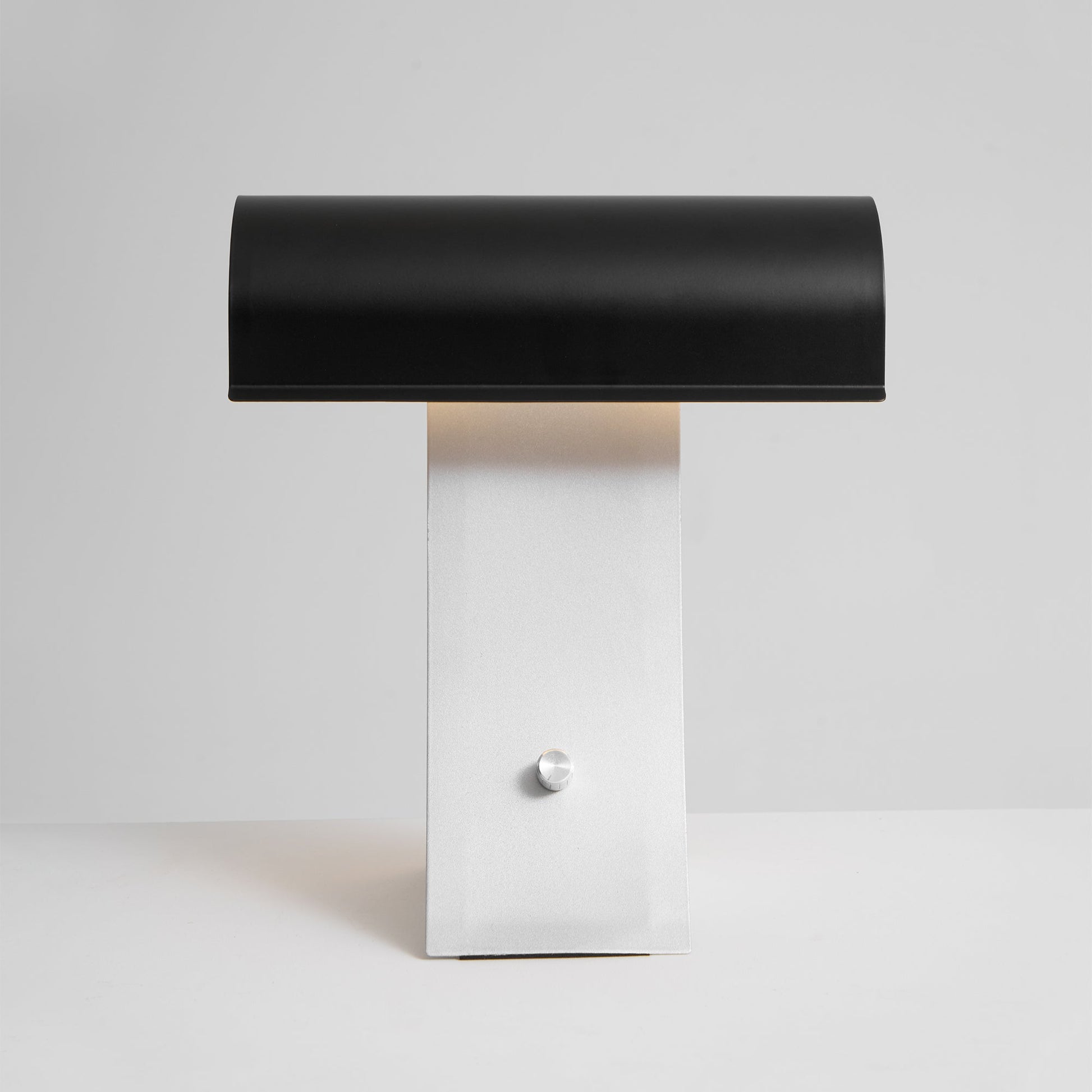 The metal body and construction of the lamp.
