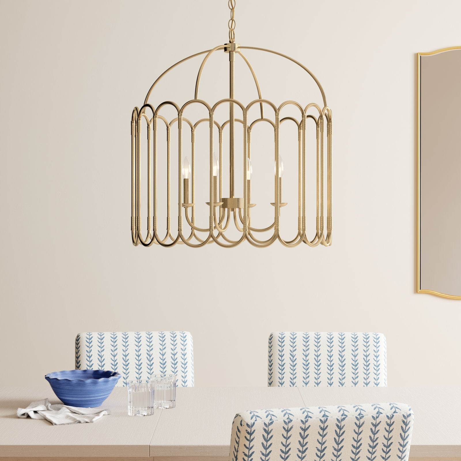 Close-up view of the Argente Chandelier's intricate openwork brass structure.