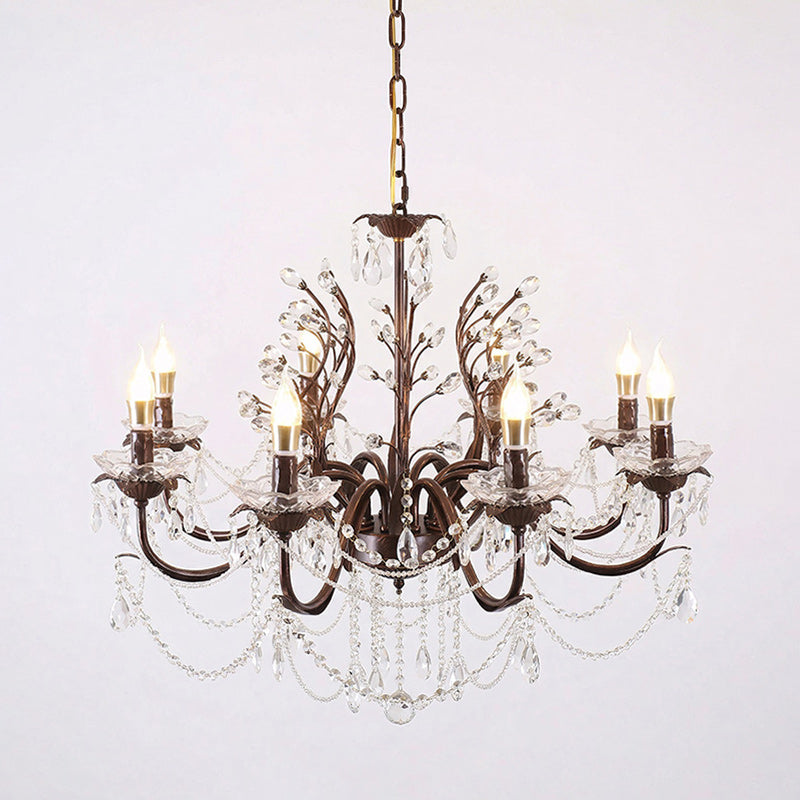 Lifestyle image featuring the Ariae Chandelier in a high-ceiling entryway.