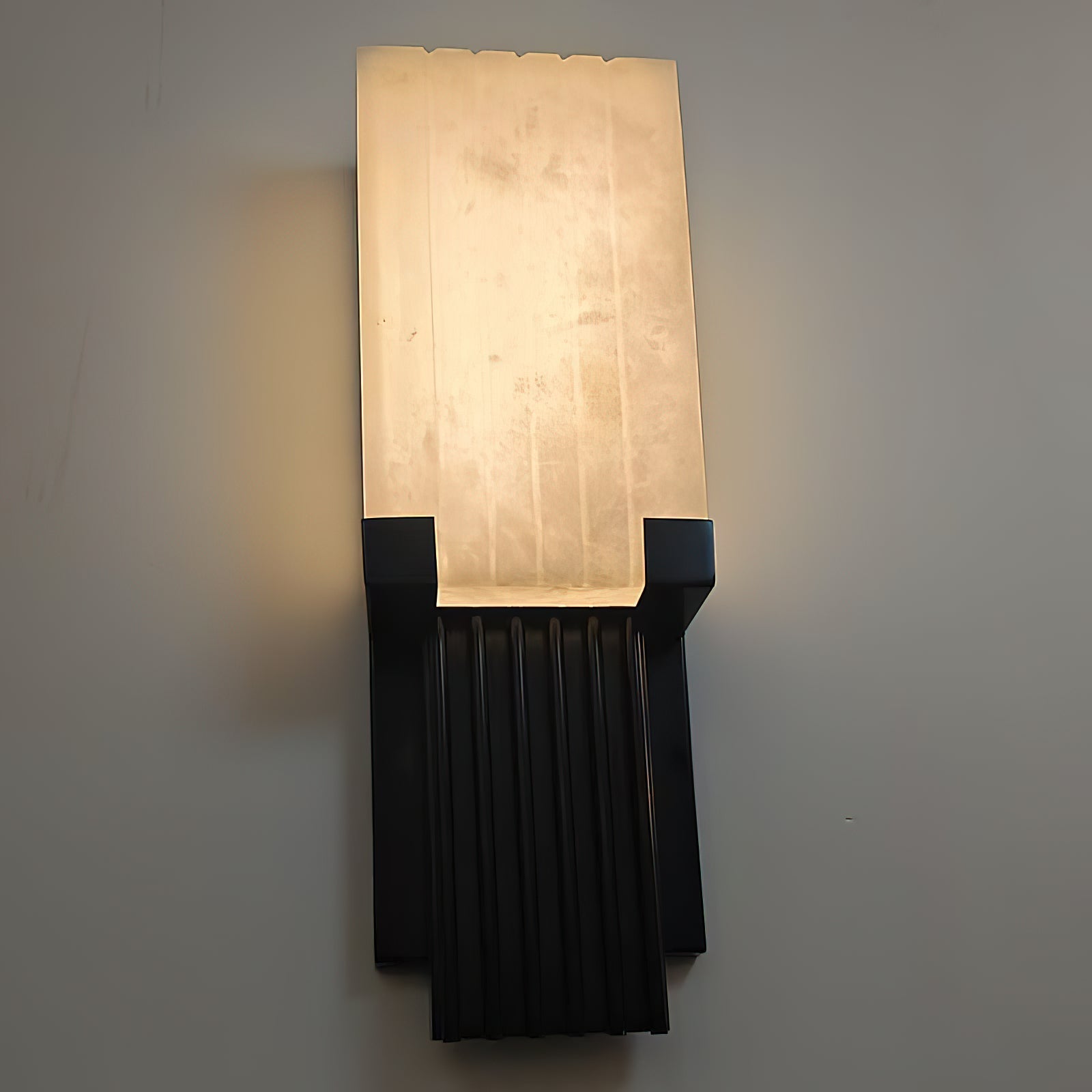 Angled view of the Ariel Wall Lamp highlighting its refined design.