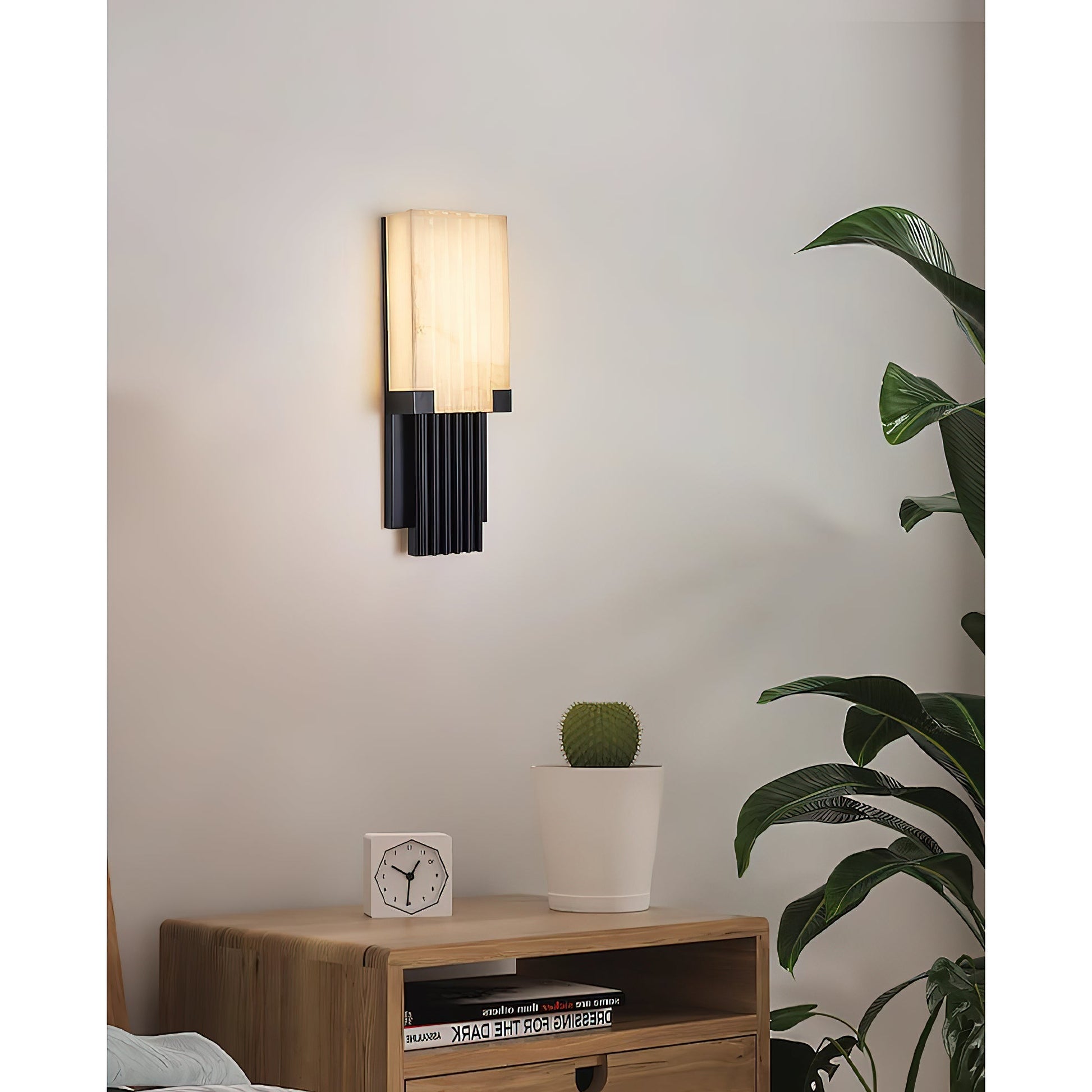 Ariel Alabaster Wall Lamp with a white stainless steel finish.
