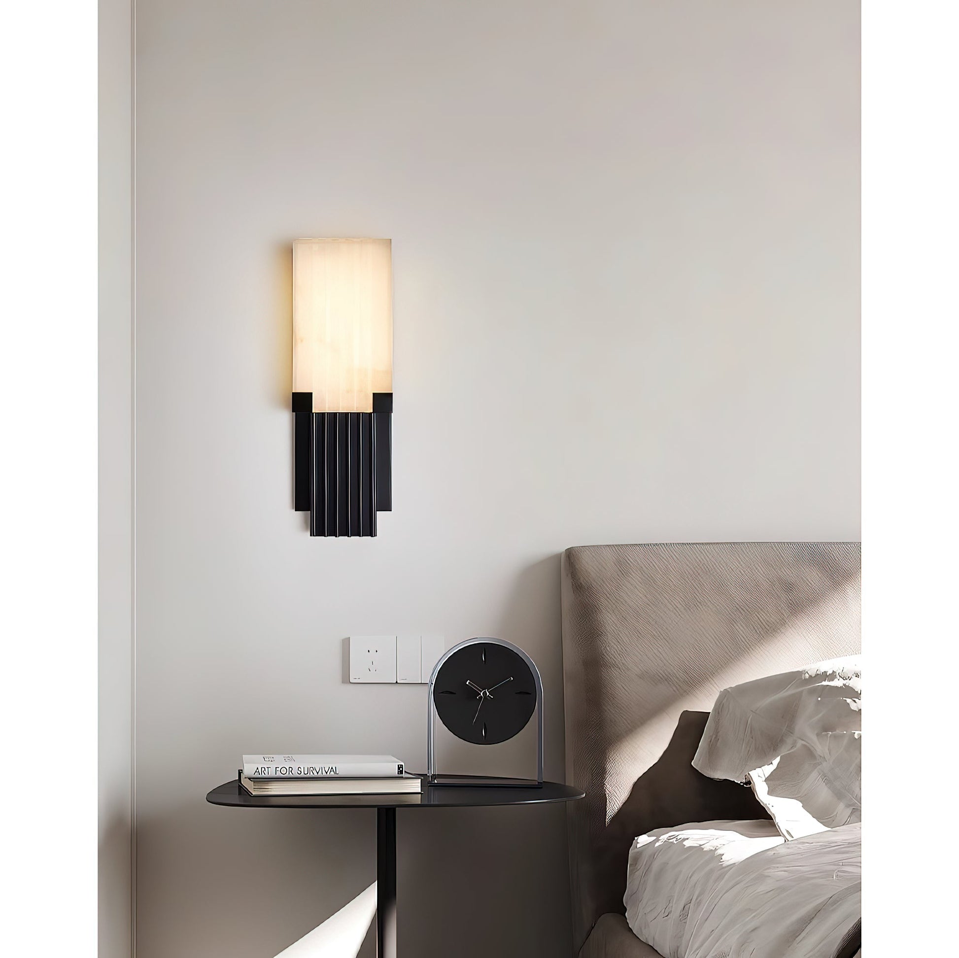 Side profile of the slim and elegant Ariel Alabaster Wall Lamp.
