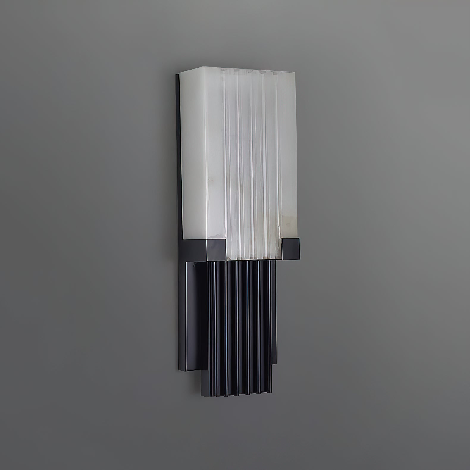 Detail shot of the junction between the stainless steel body and the alabaster shade.