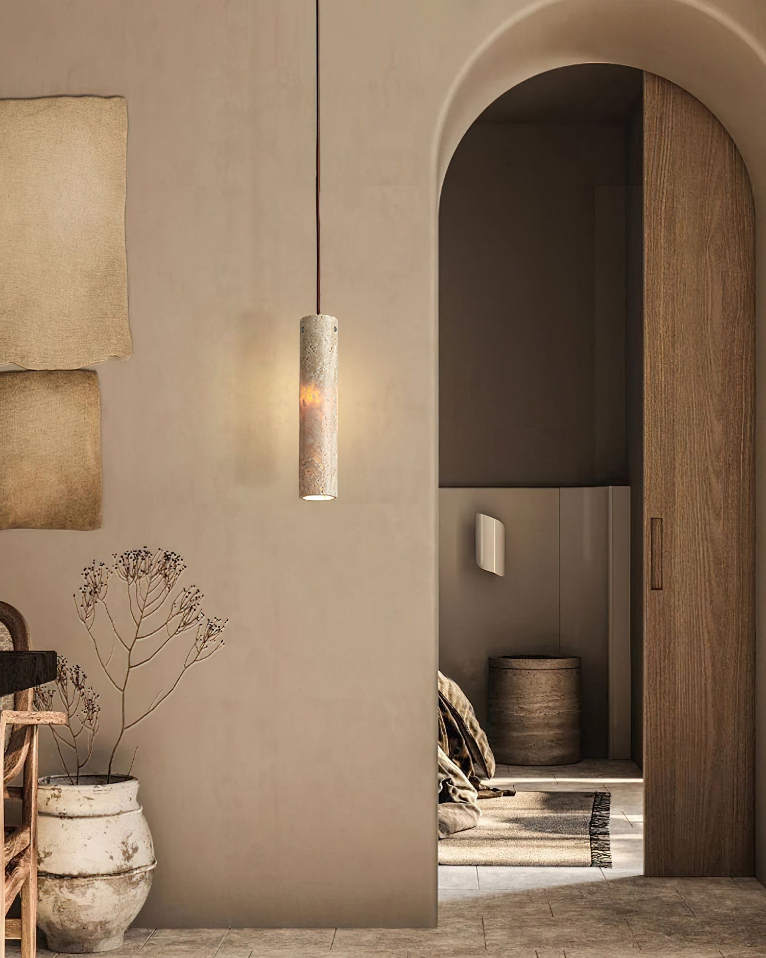 Three Arlene Pendant Lamps hanging in a row over a kitchen island.