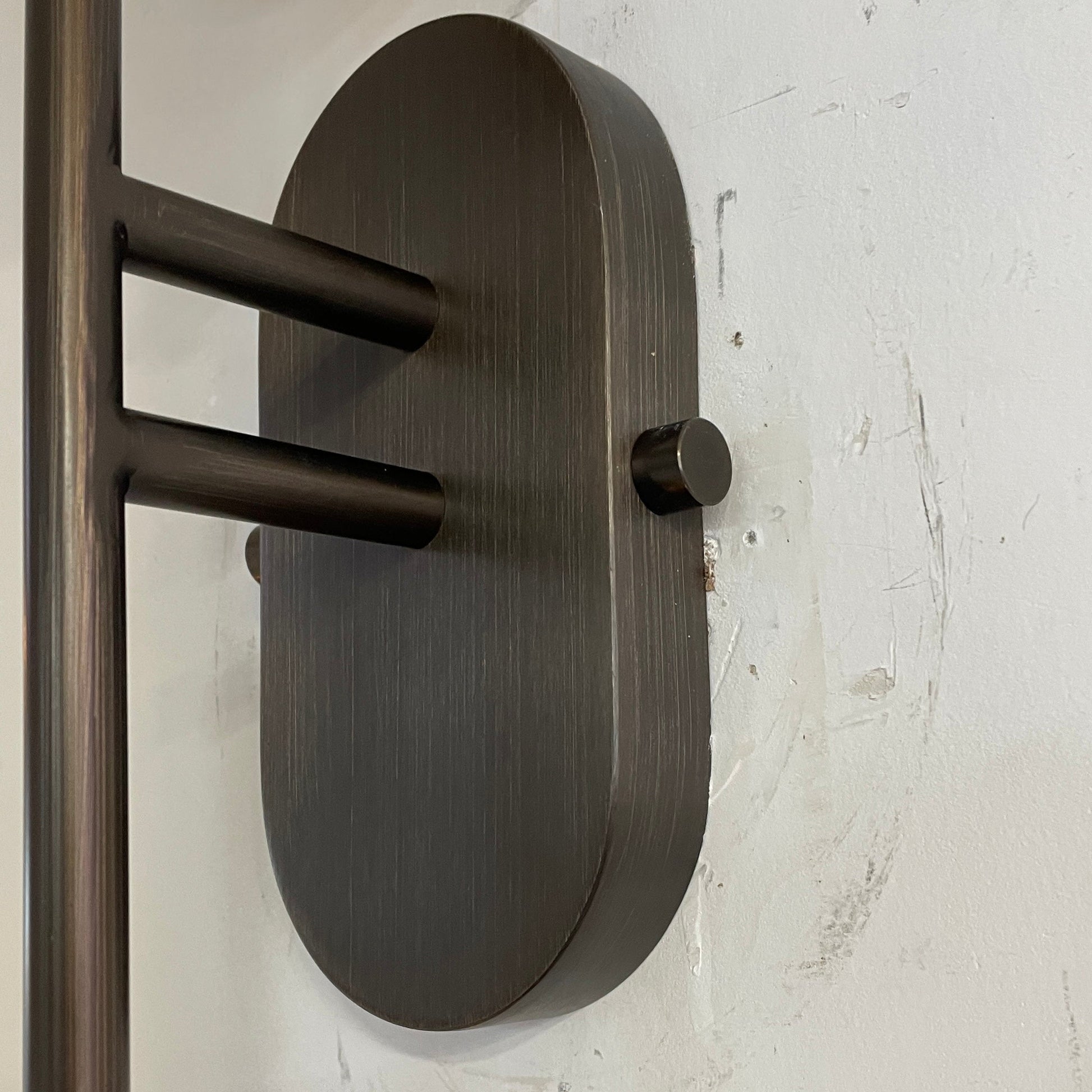 Two Arras Wall Lamps installed symmetrically on a feature wall.