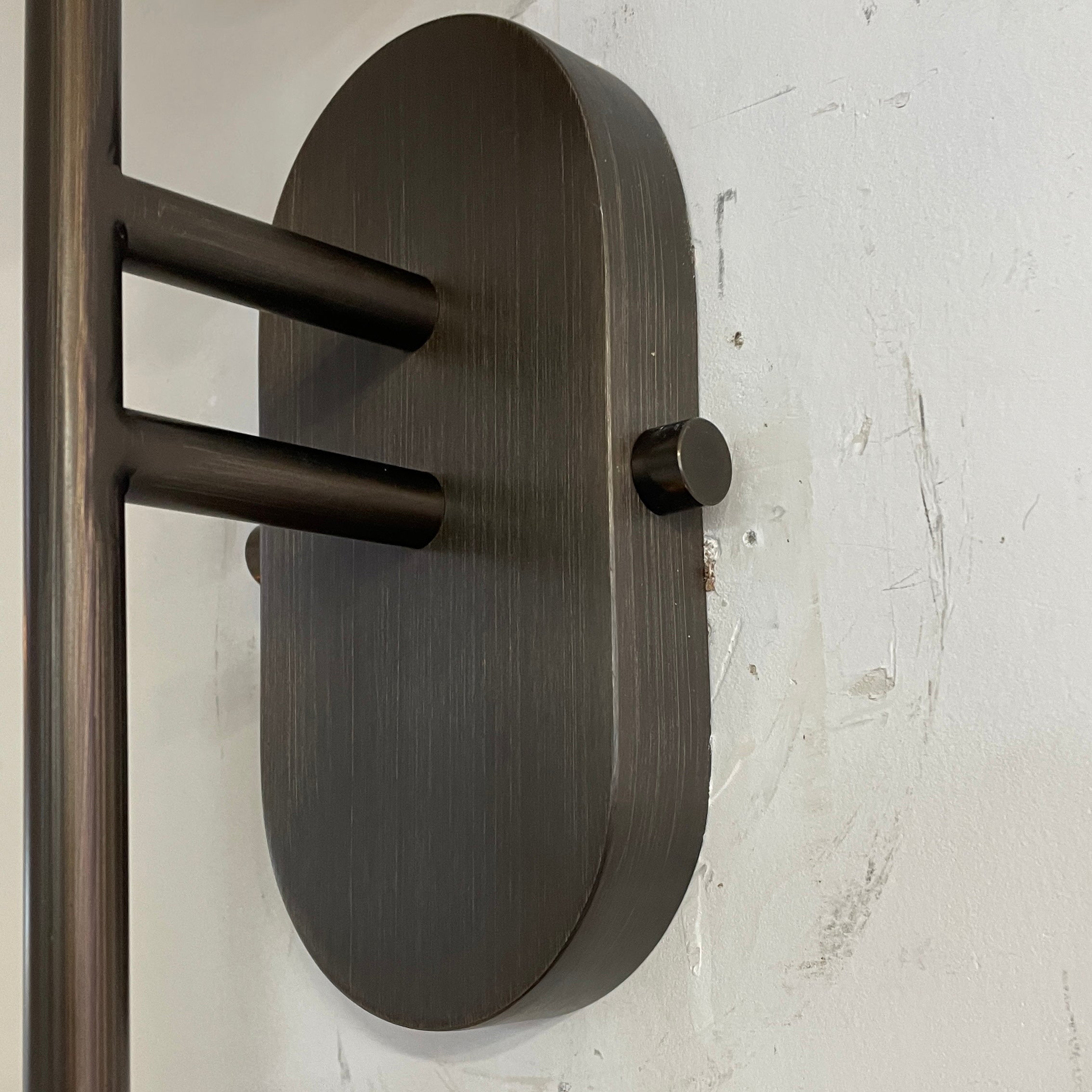 Two Arras Wall Lamps installed symmetrically on a feature wall.