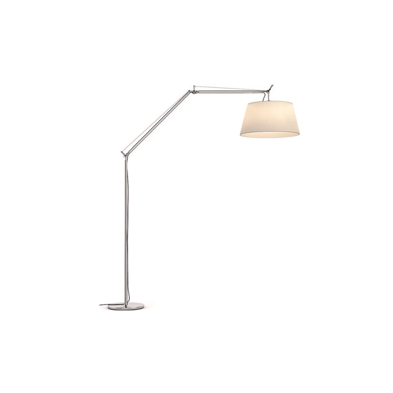 Costanza Floor Lamp illuminating a cozy corner.