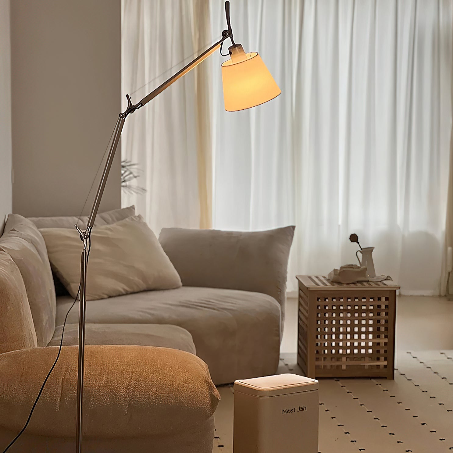 Detail shot of the lamp's base and sleek aluminum body.