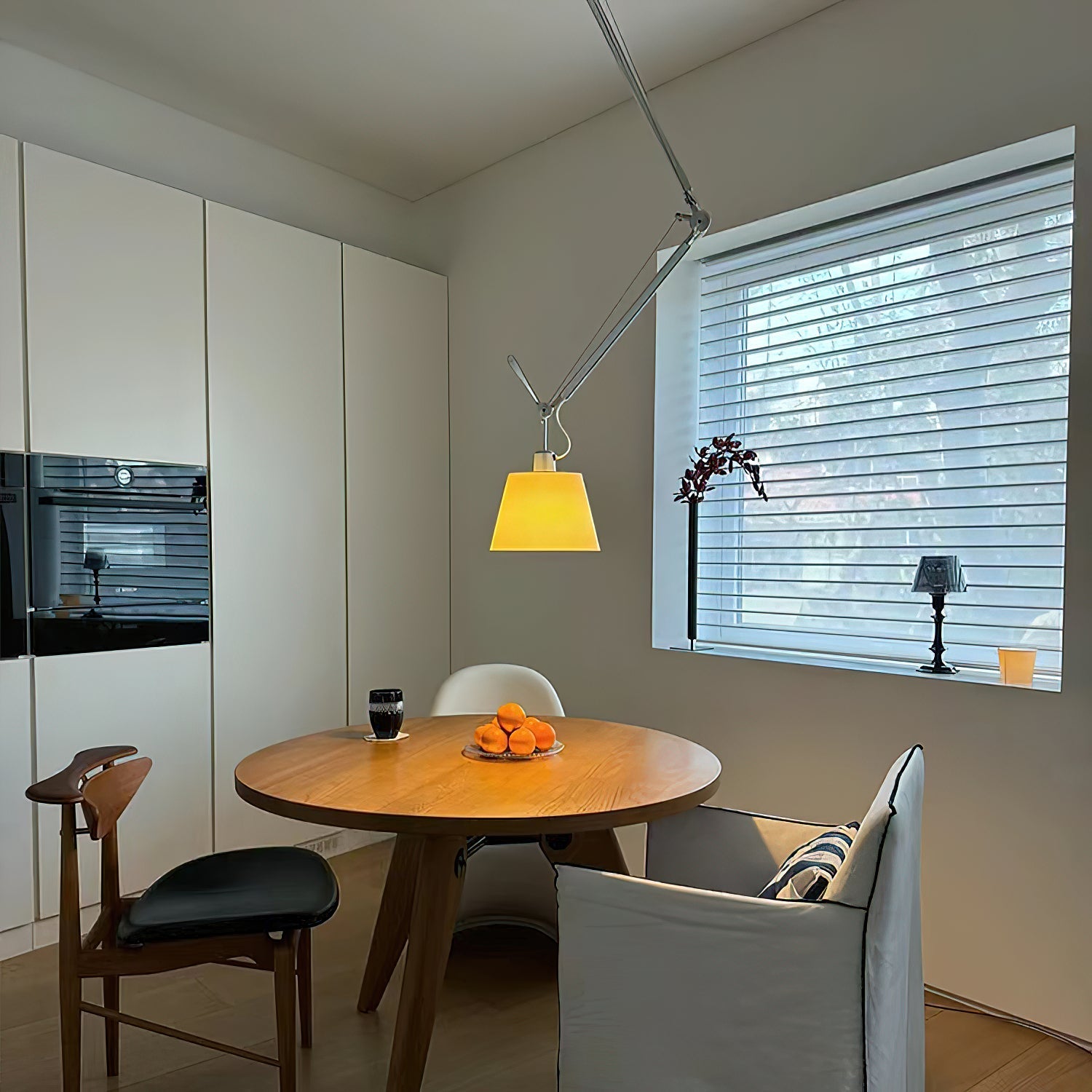 The suspension rod and ceiling canopy of the Costanza Pendant Lamp.