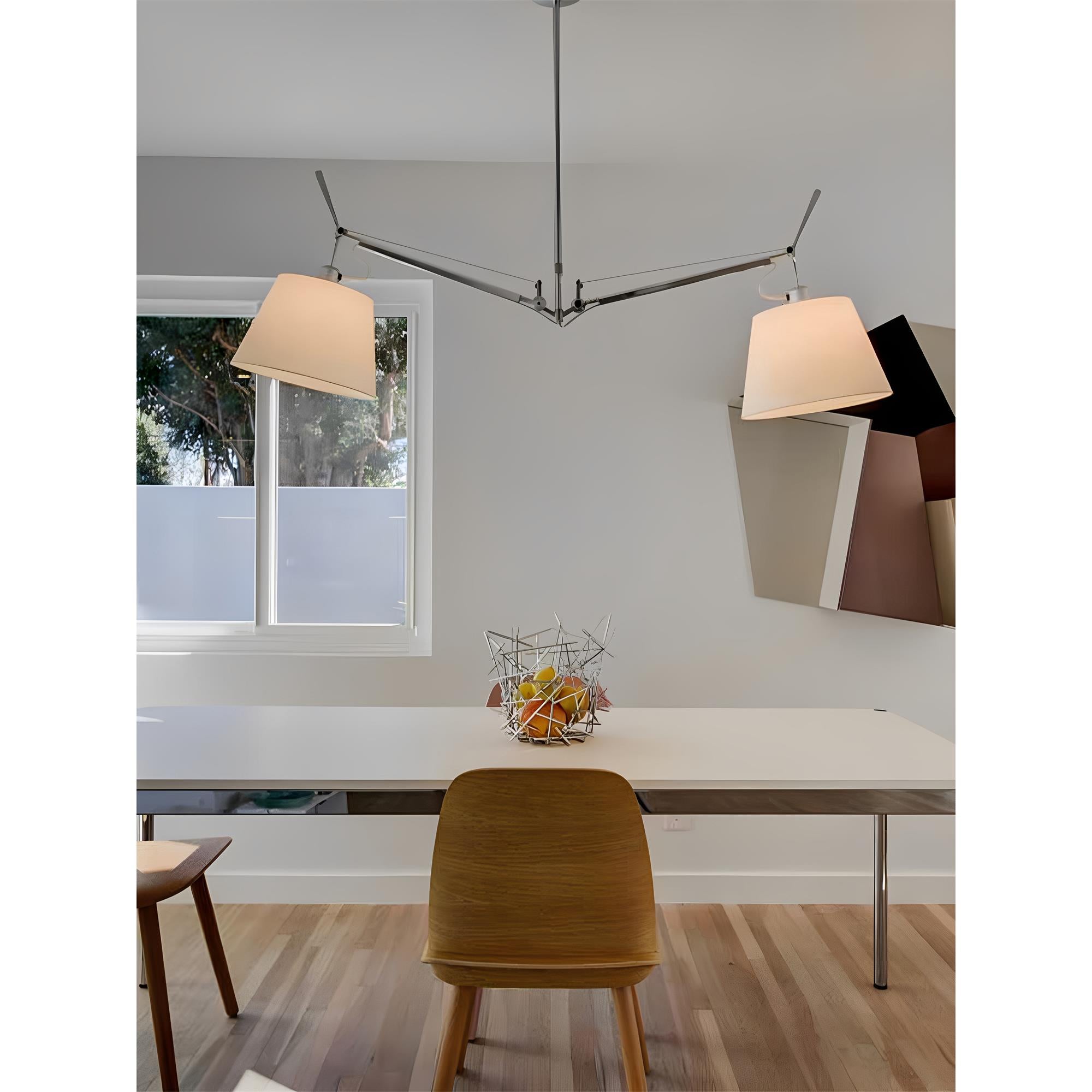 The large Costanza Pendant Lamp as a centerpiece in a high-ceiling room.
