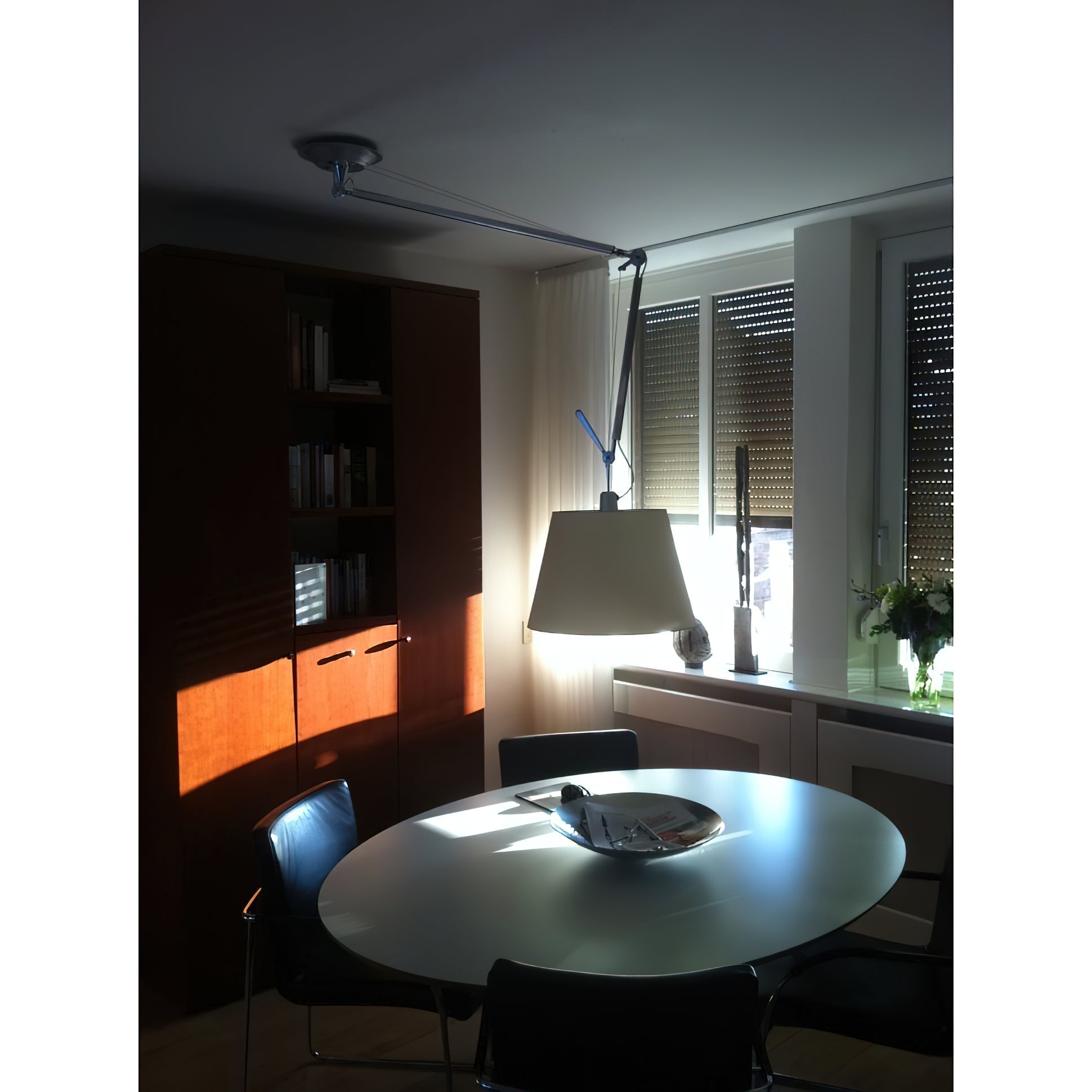 Costanza Pendant Lamp in white, matching a minimalist interior.