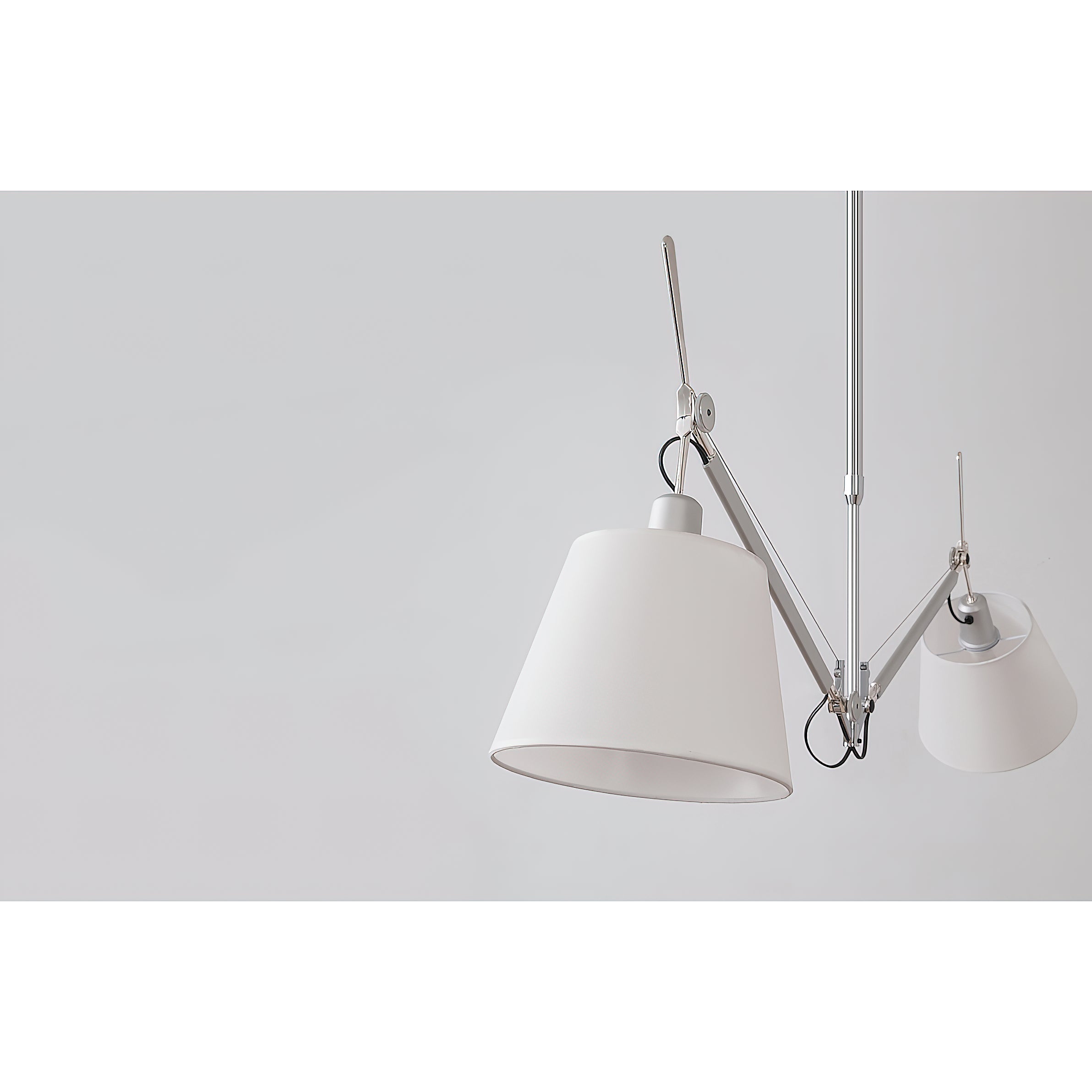 The two-head lamp in a commercial setting like a cafe.