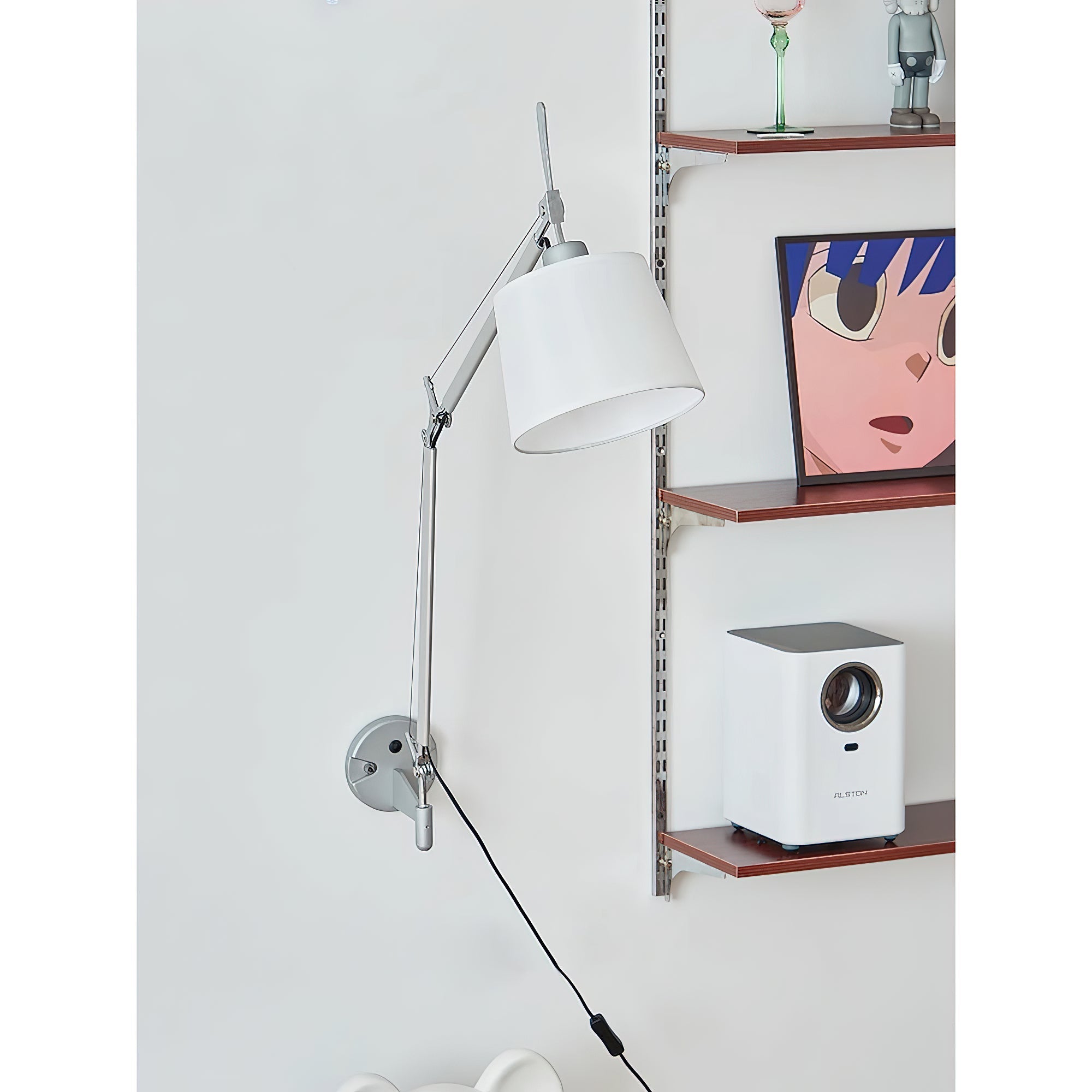 Side view of the Costanza lamp showing the two-segment arm and tilting shade.