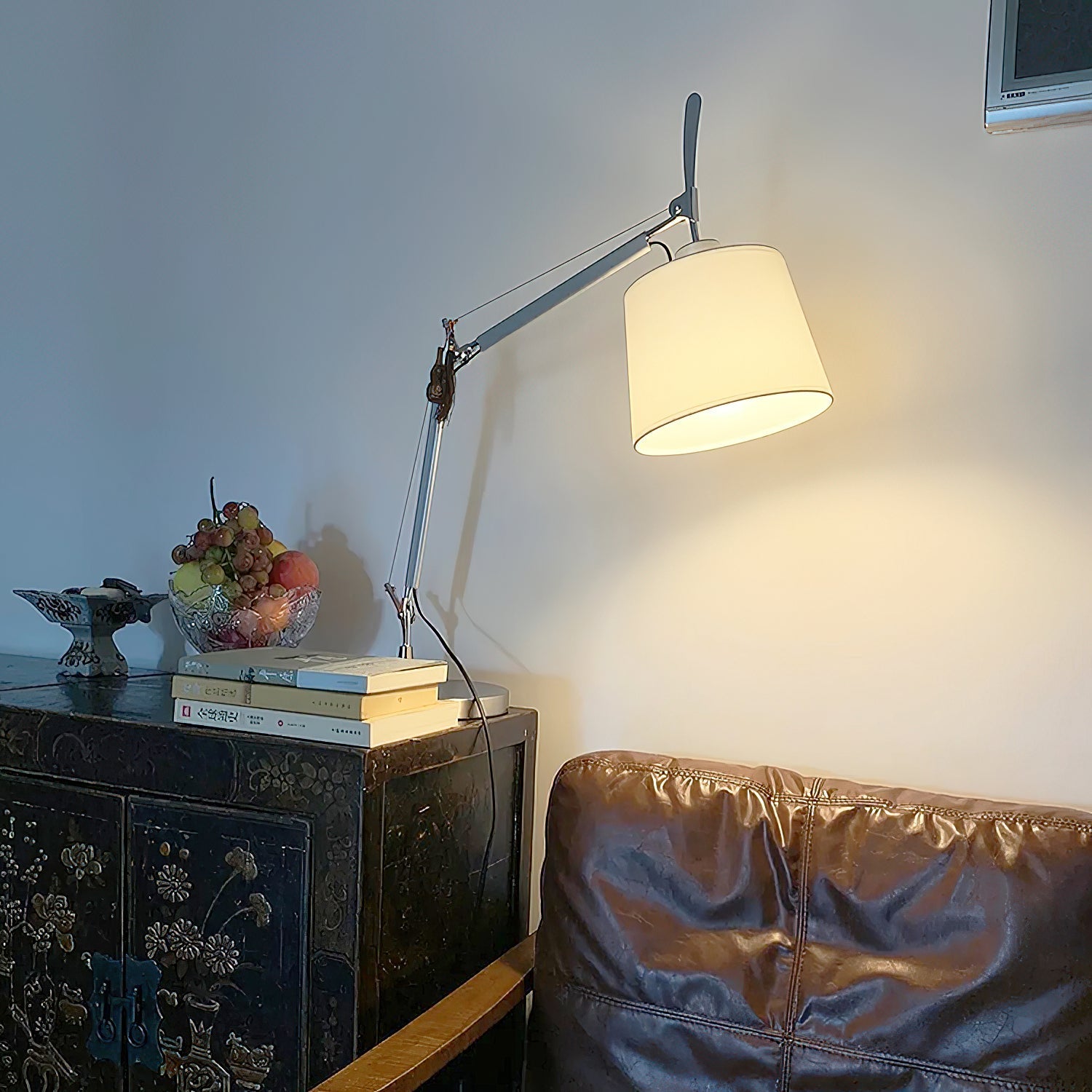 Angled view of the Costanza Table Lamp showcasing its sleek profile.