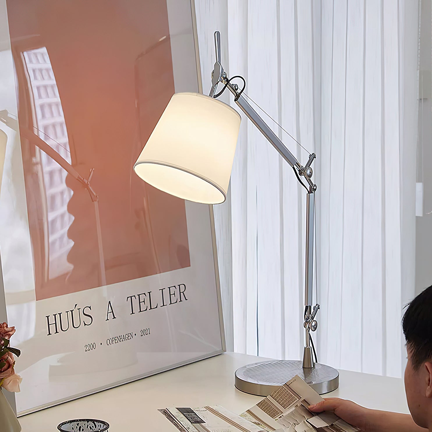 Costanza Table Lamp displayed on a side table in a modern living room.
