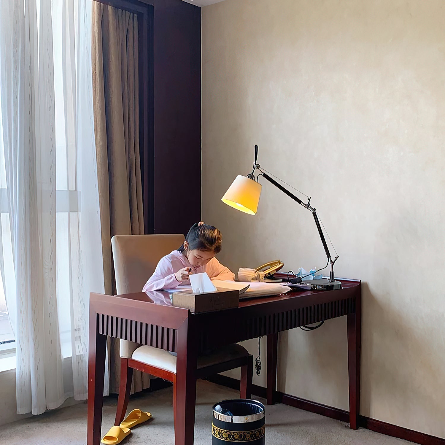 A lifestyle image featuring the lamp in a sophisticated interior space.