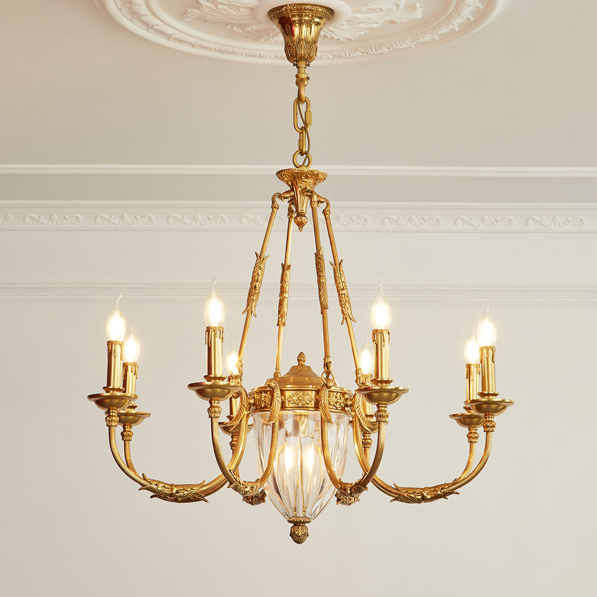 The intricate cut facets of the central crystal pendant.