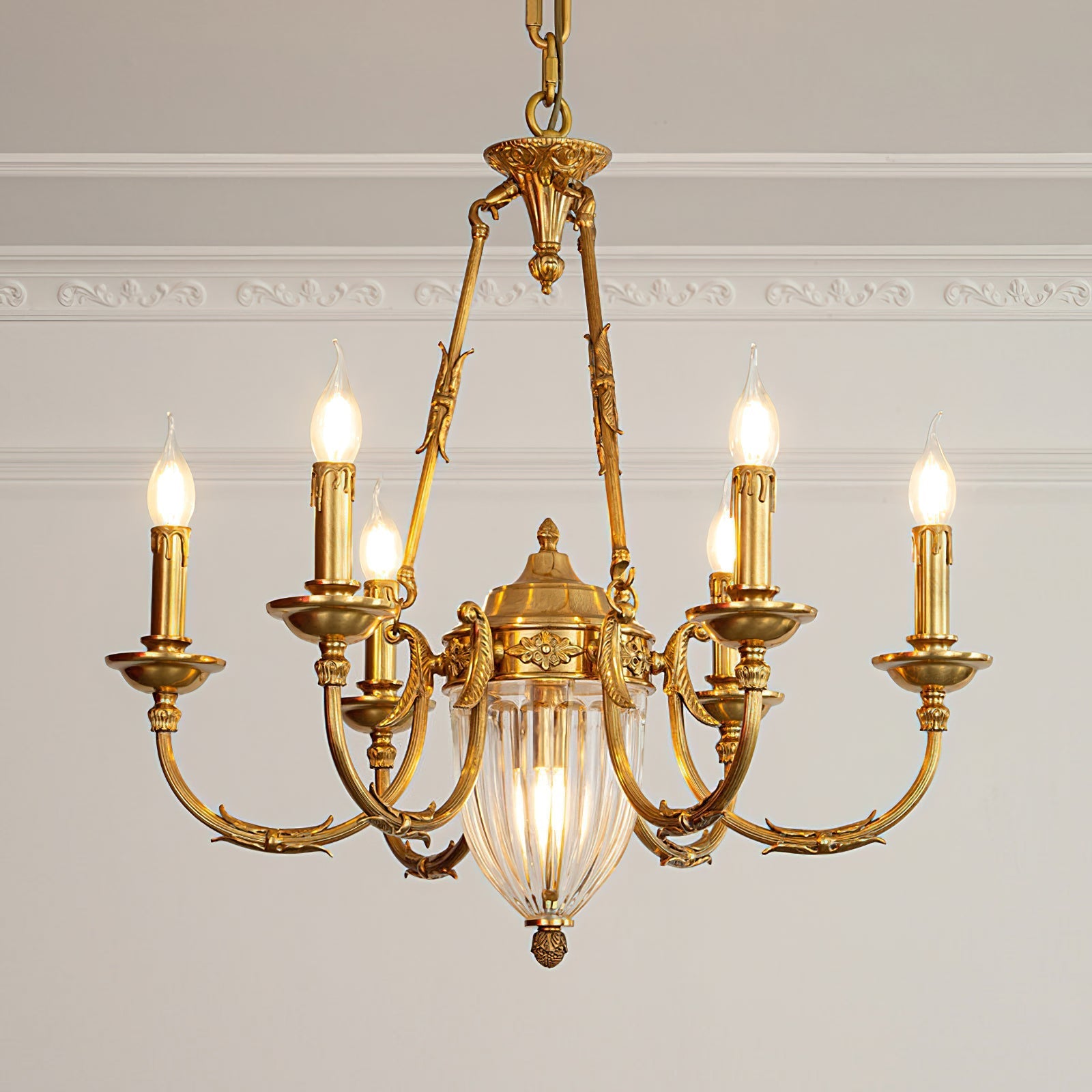 Front view of the Ashford Brass Chandelier with its central crystal drop.