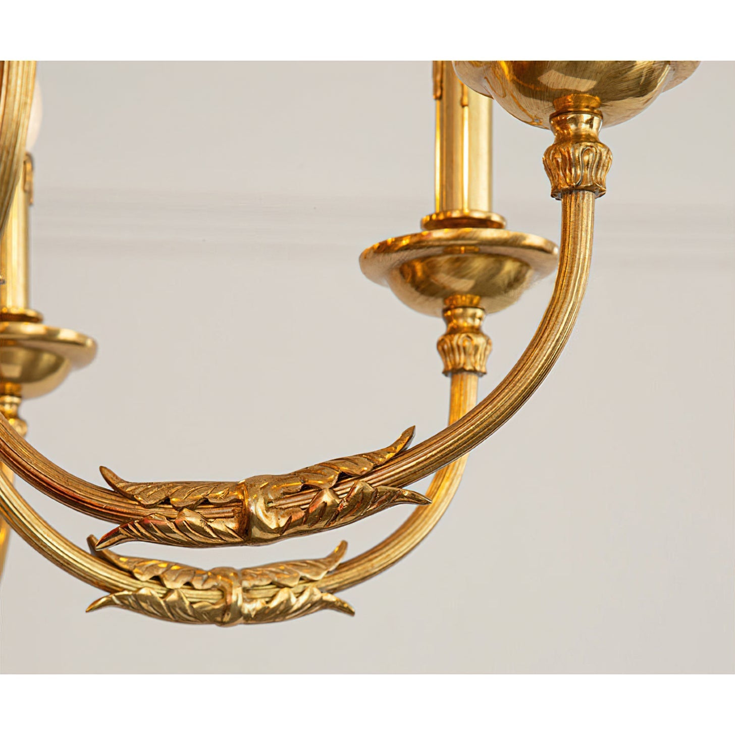 Close-up of the cast brass arms and candelabra sockets on the Ashford Chandelier.