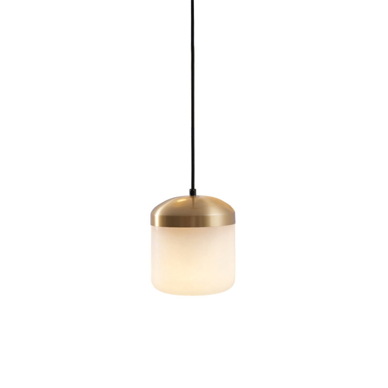 The texture of the brass body on the Asta lamp.