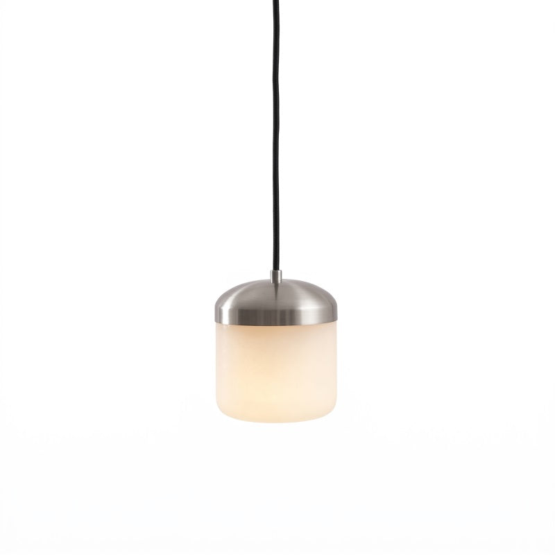 The smooth, polished surface of the alabaster shade.