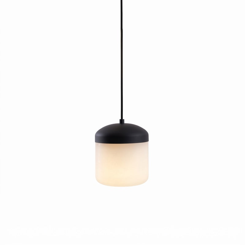 Asta Alabaster Pendant Lamp, brass finish, in a living room.