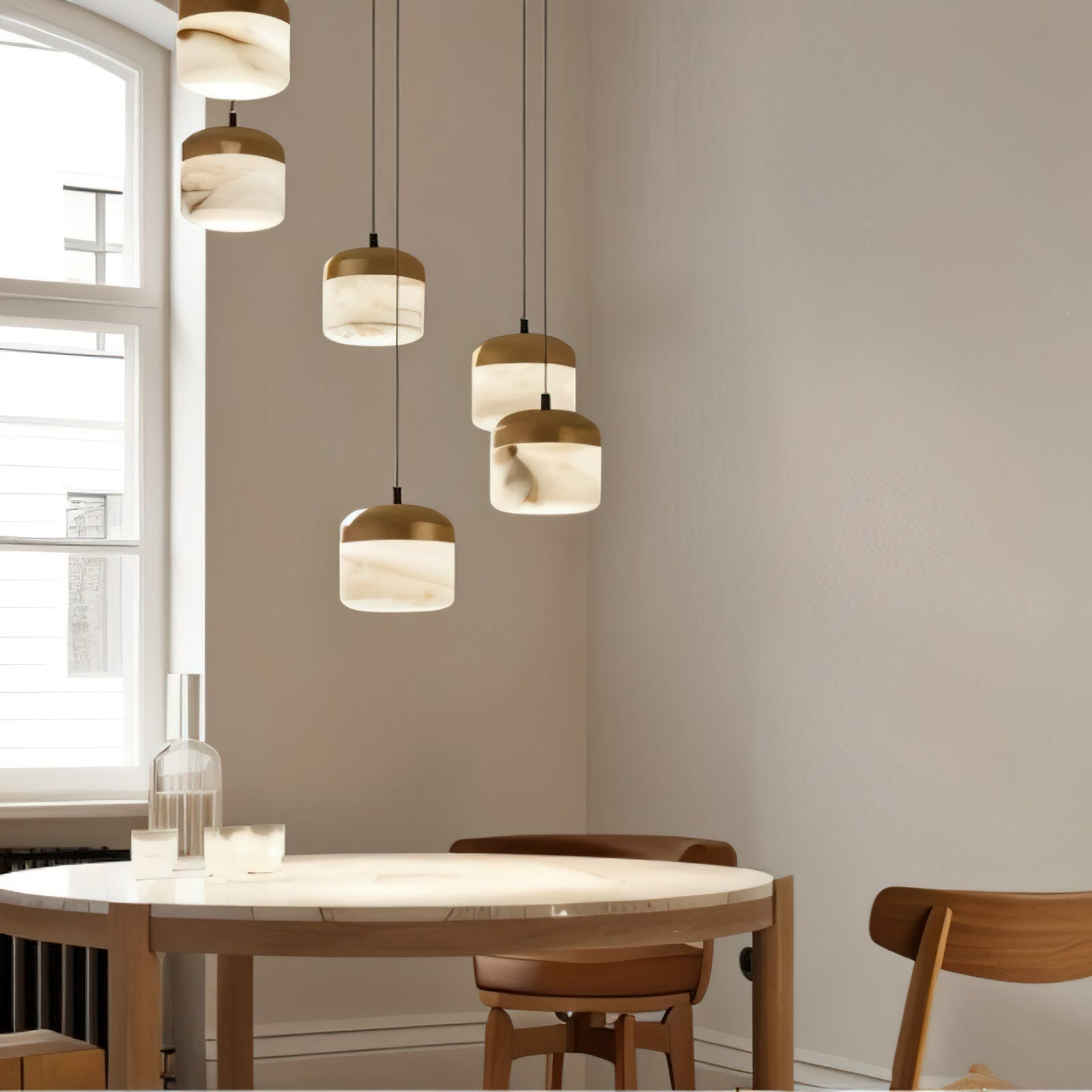 Close-up of the Asta pendant lamp's natural alabaster shade.