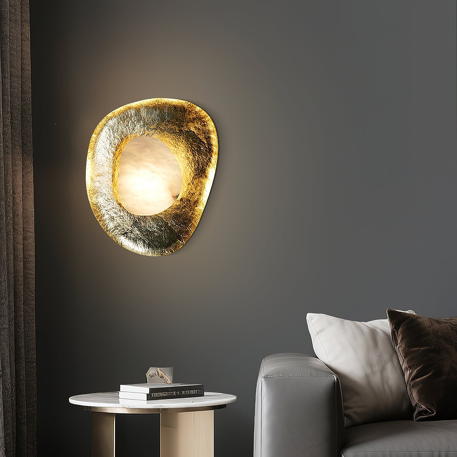 Close-up of the hammered brass texture on the Astoria Sconce.