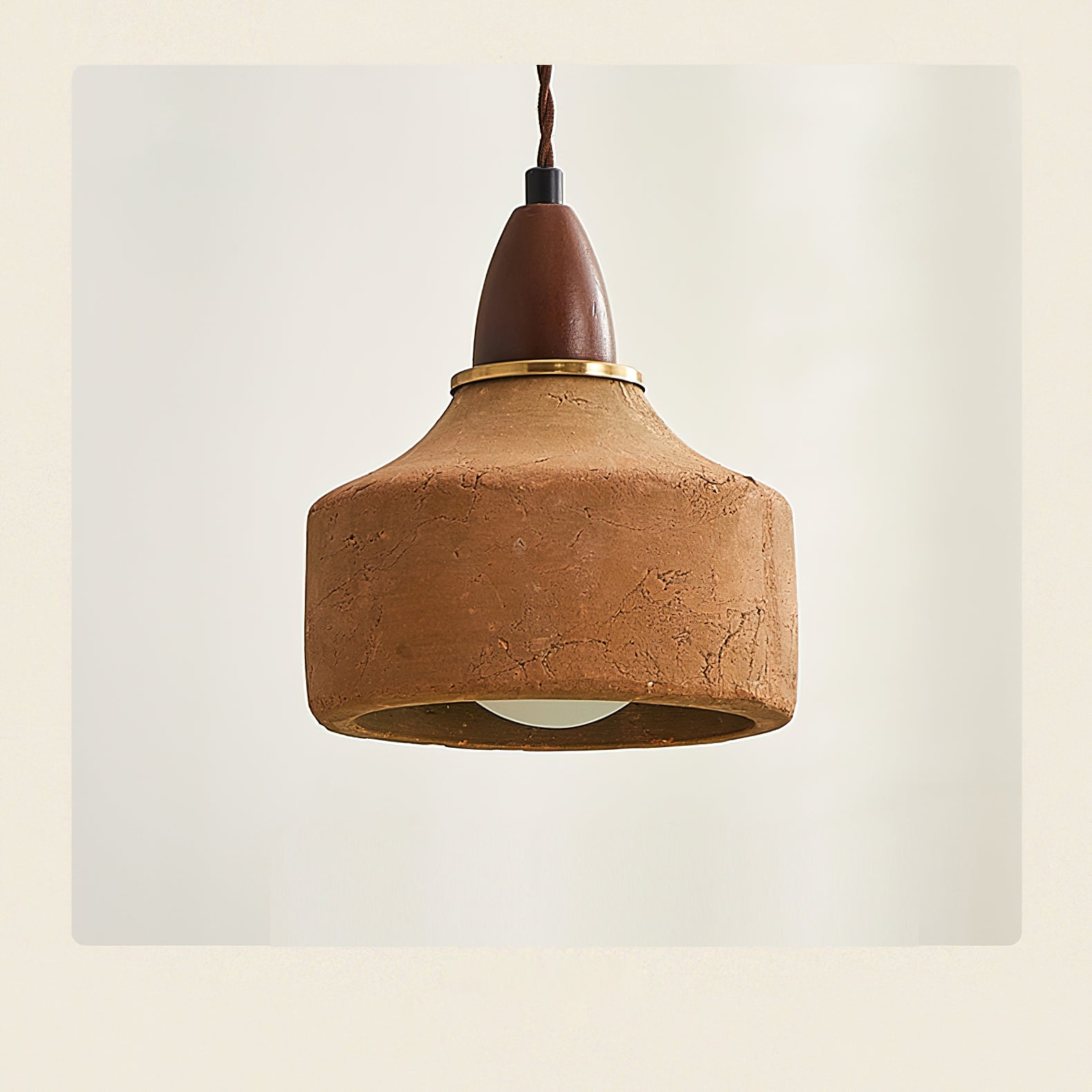 A pair of Auburn Pendant Lights hanging over a kitchen island.